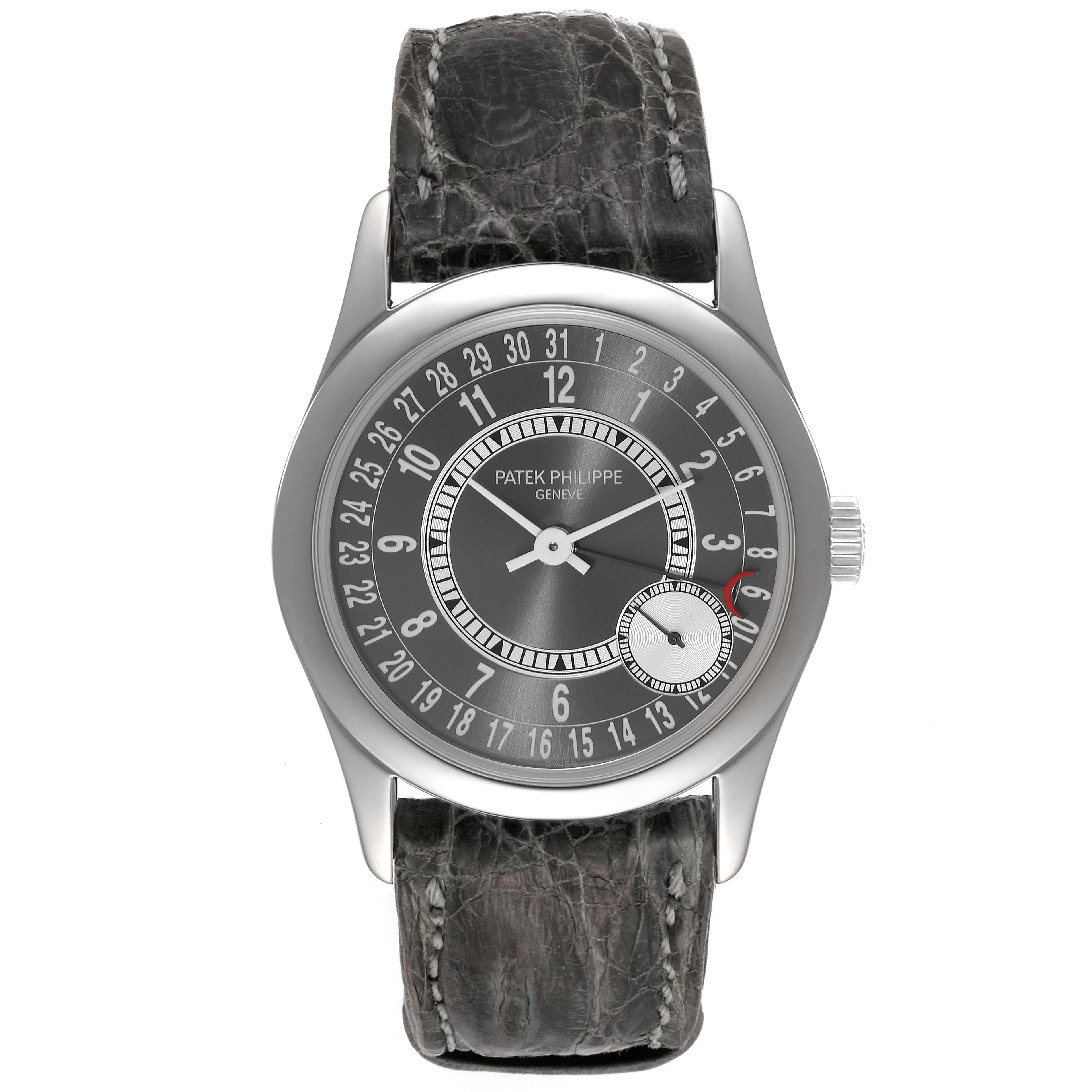 The image shows a front view of a Patek Philippe Calatrava 6000G Men's White Gold Grey Dial 6000G Men's White Gold Grey Dial watch, highlighting its dial, hands, and leather strap.