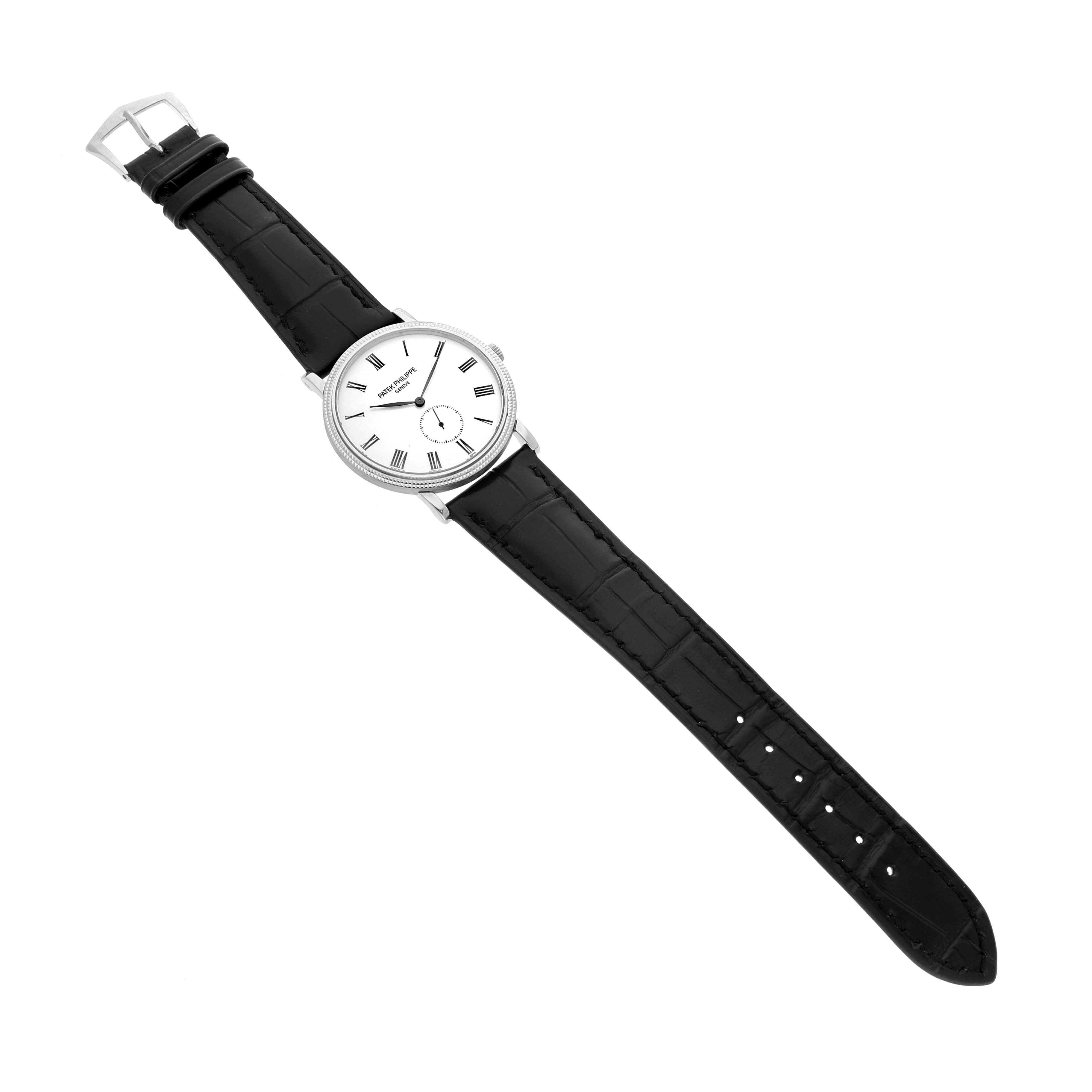 The Patek Philippe Calatrava 5116G Men's White Gold White Dial watch is shown from a top-down angle, displaying the face, bezel, and entire leather strap.