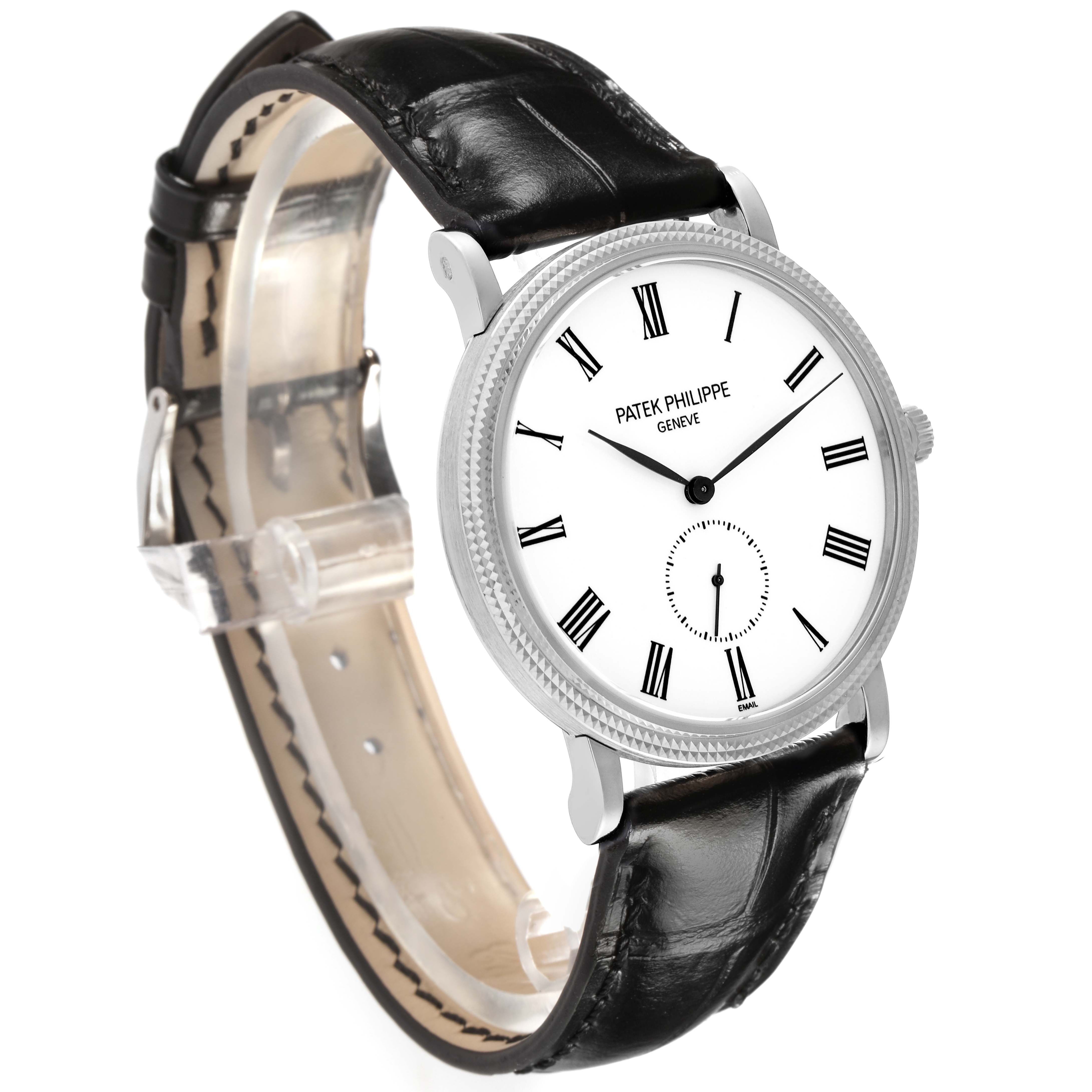 The Patek Philippe Calatrava 5116G Men's White Gold White Dial watch is shown at an angled side view, highlighting the white dial with Roman numerals and black leather strap.