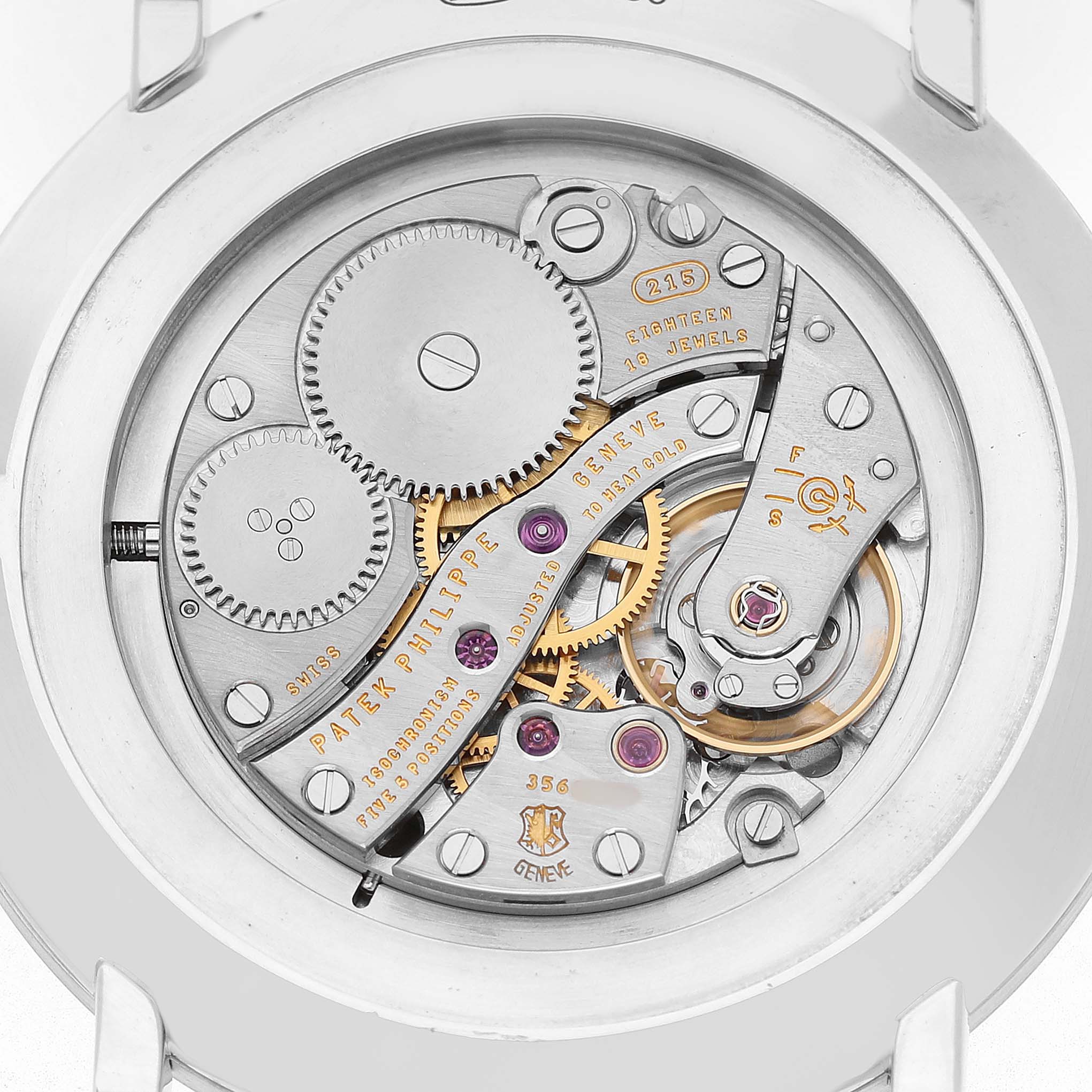 The image shows the case back of a Patek Philippe Calatrava 5119G-001 Men's White Gold White Dial watch, revealing its intricate mechanical movement components.