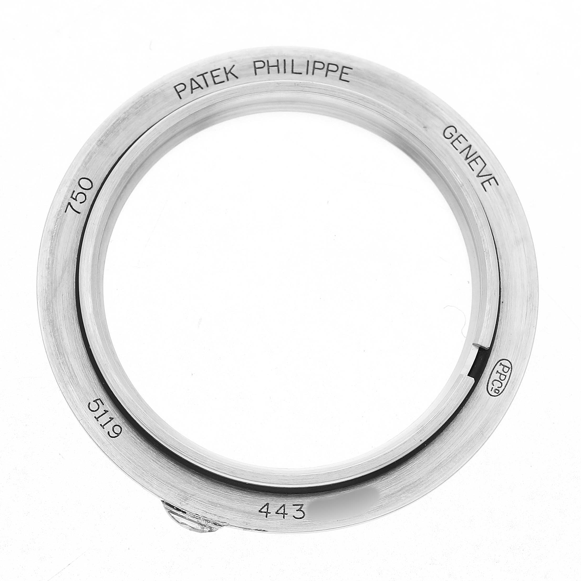 The image shows an overhead view of the bezel for a Patek Philippe Calatrava 5119G-001 Men's White Gold White Dial watch.