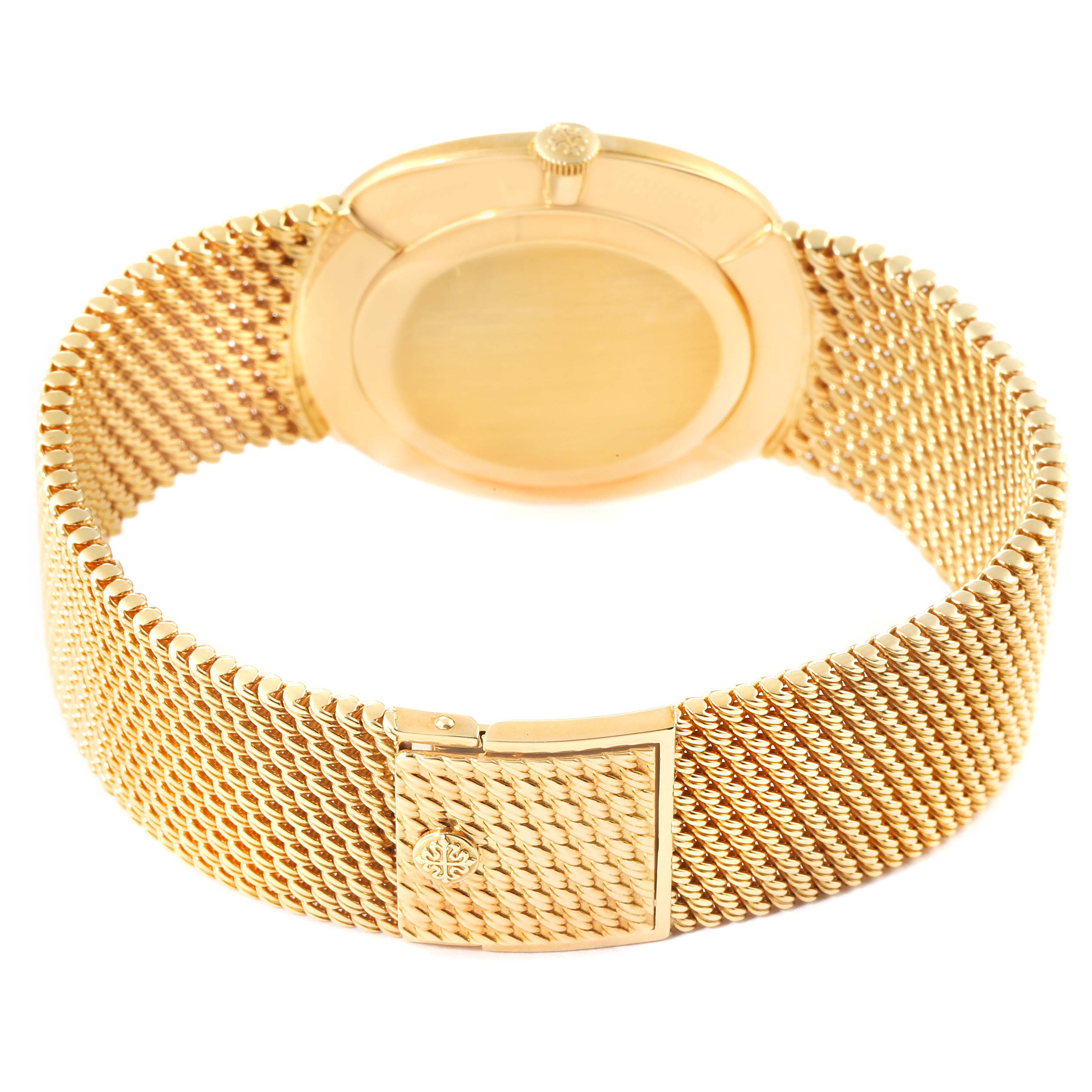 The image shows the back view of a Patek Philippe 3844 Men's Yellow Gold Brown Dial 3844 Men's Yellow Gold Brown Dial Ellipse 18k Yellow Gold Reddish Brown Dial Watch 3844 with its gold mesh bracelet and clasp.