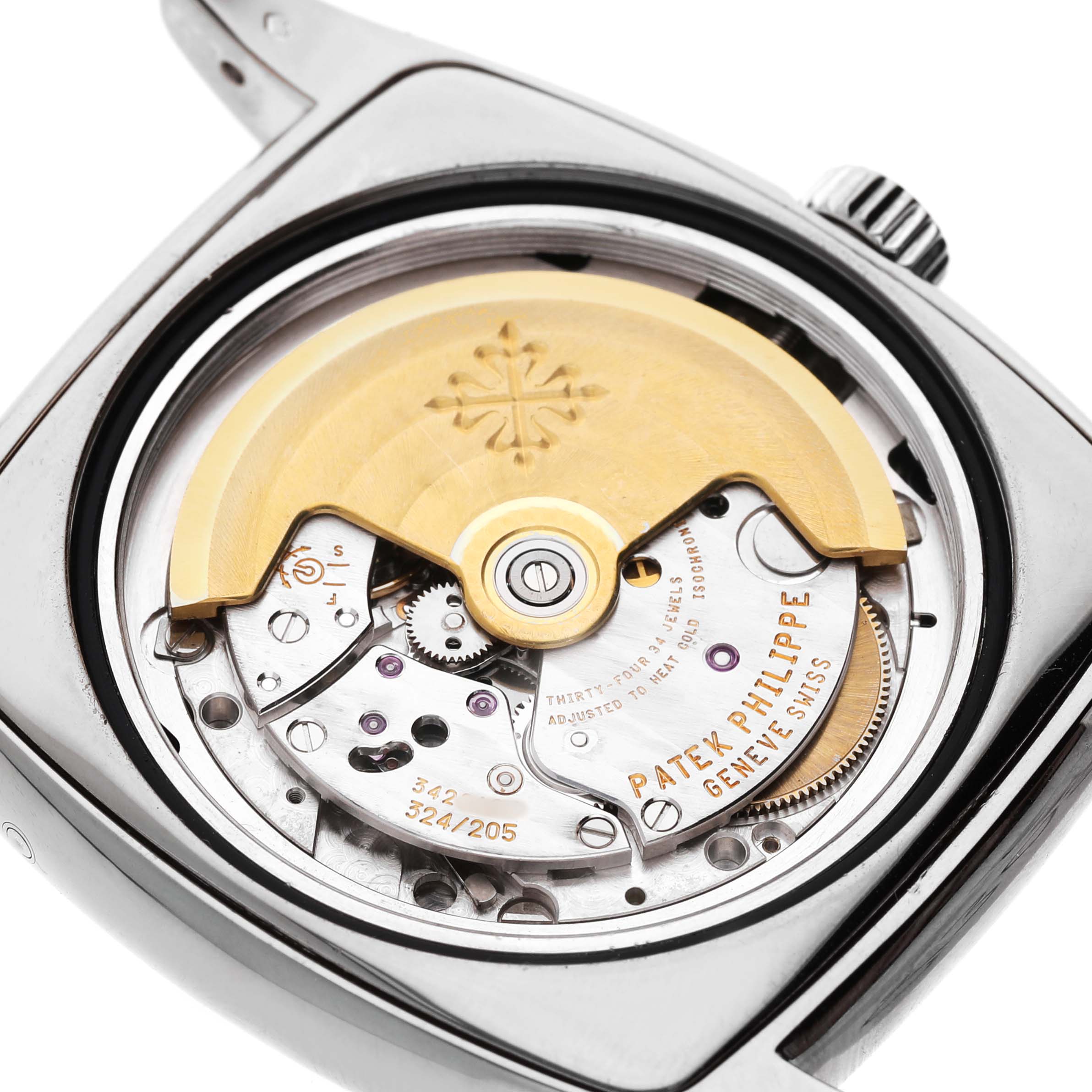 The image shows the back of a Patek Philippe Gondolo 5135G-001 Men's White Gold Grey Dial, highlighting its mechanical movement and rotor.