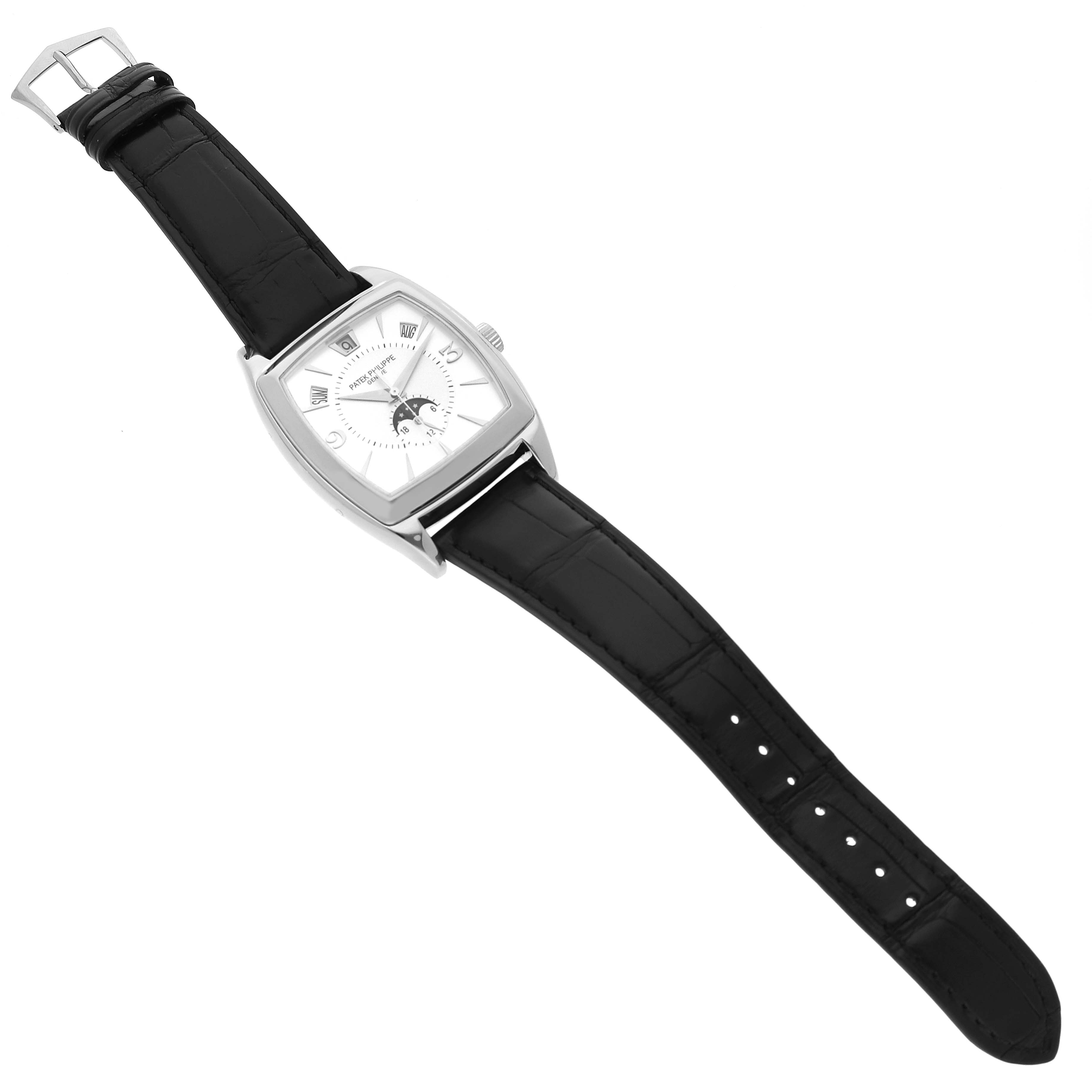 The Patek Philippe Gondolo 5135G-001 Men's White Gold Grey Dial watch is shown from a top-down angle, displaying its face, case, and full black strap.