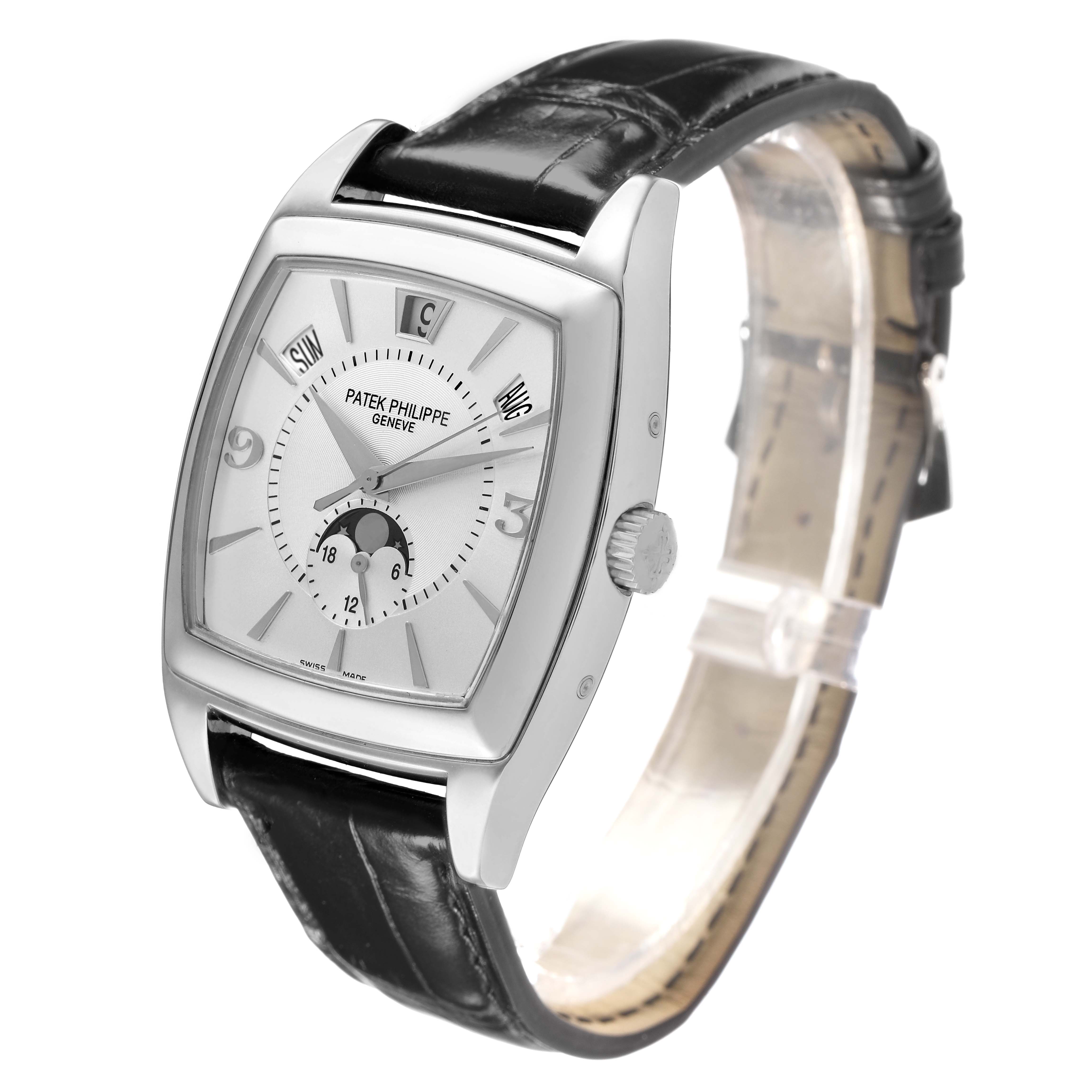 The Patek Philippe Gondolo 5135G-001 Men's White Gold Grey Dial watch is shown at an angled side view, highlighting its dial, crown, and leather strap.