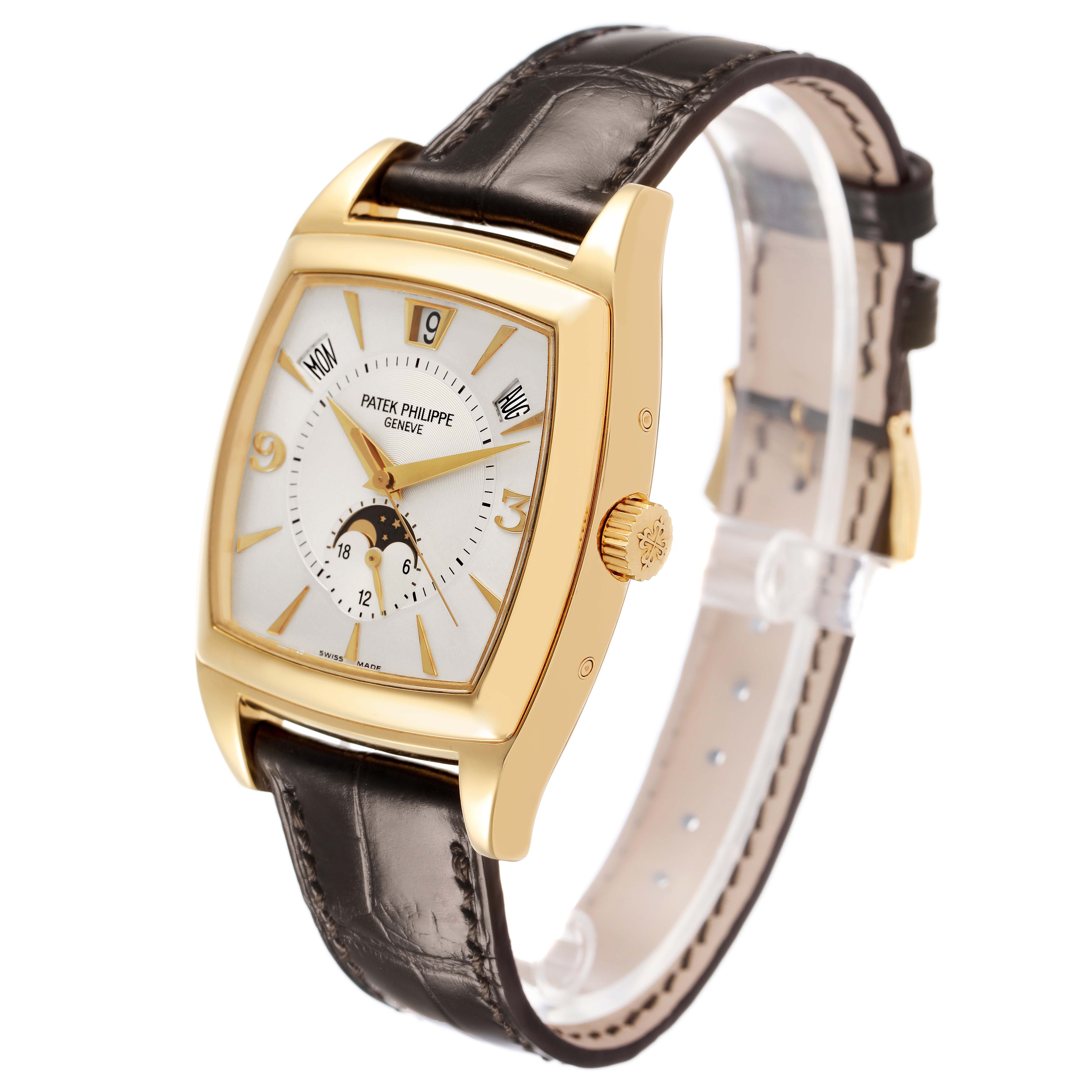The Patek Philippe Gondolo 5135J-001 Men's Yellow Gold Silver Dial watch is shown at a three-quarter angle, displaying the face, dial, crown, and leather strap.