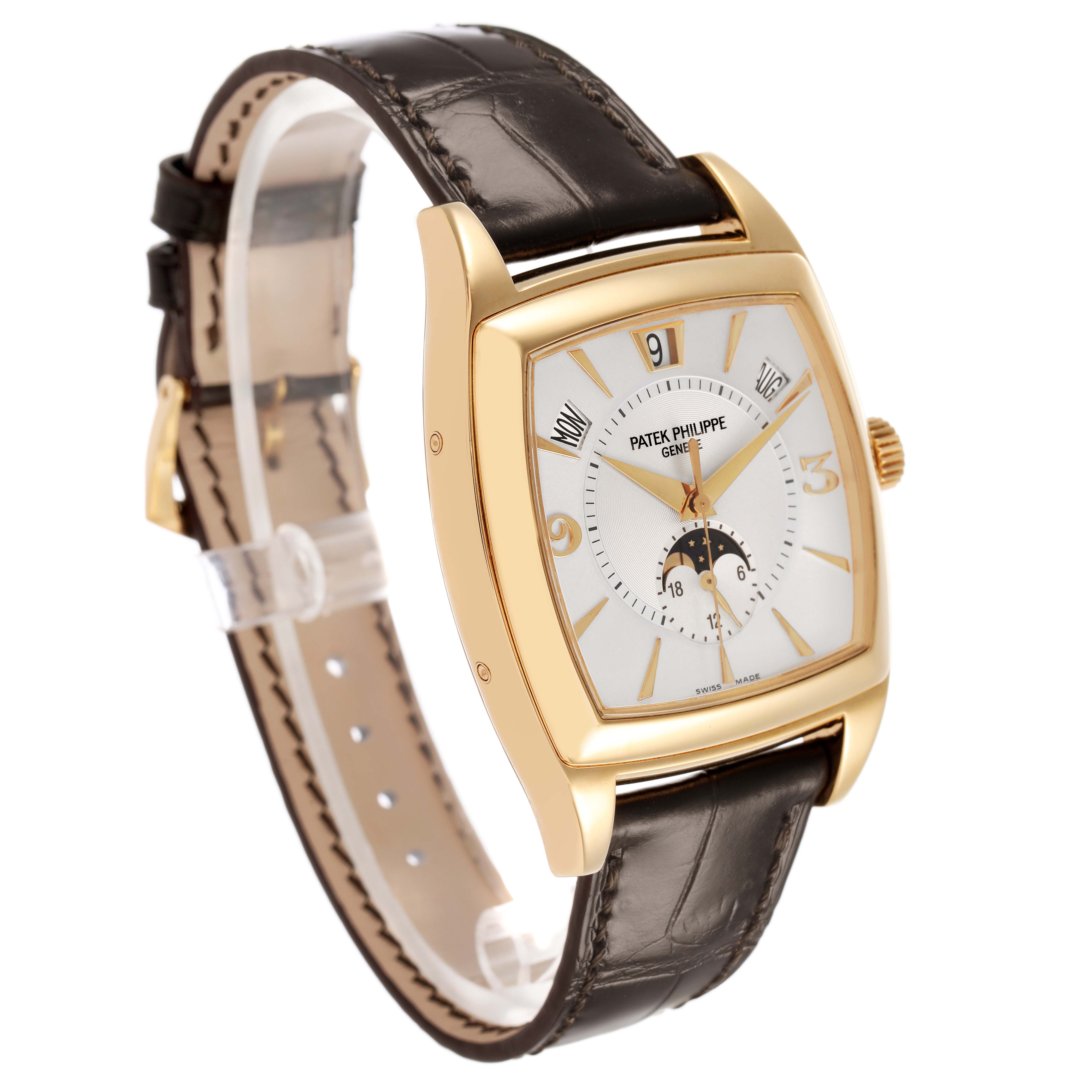 The Patek Philippe Gondolo 5135J-001 Men's Yellow Gold Silver Dial is shown at an angled view displaying the face, bezel, crown, and leather strap.