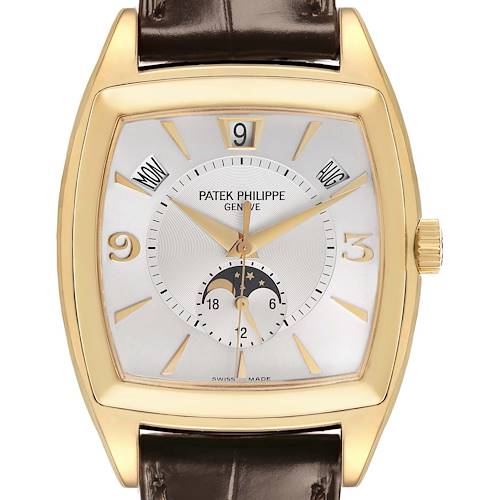 The Patek Philippe Gondolo 5135J-001 Men's Yellow Gold Silver Dial watch is shown from a front angle, displaying the dial, day, month, and moon phase indicators.