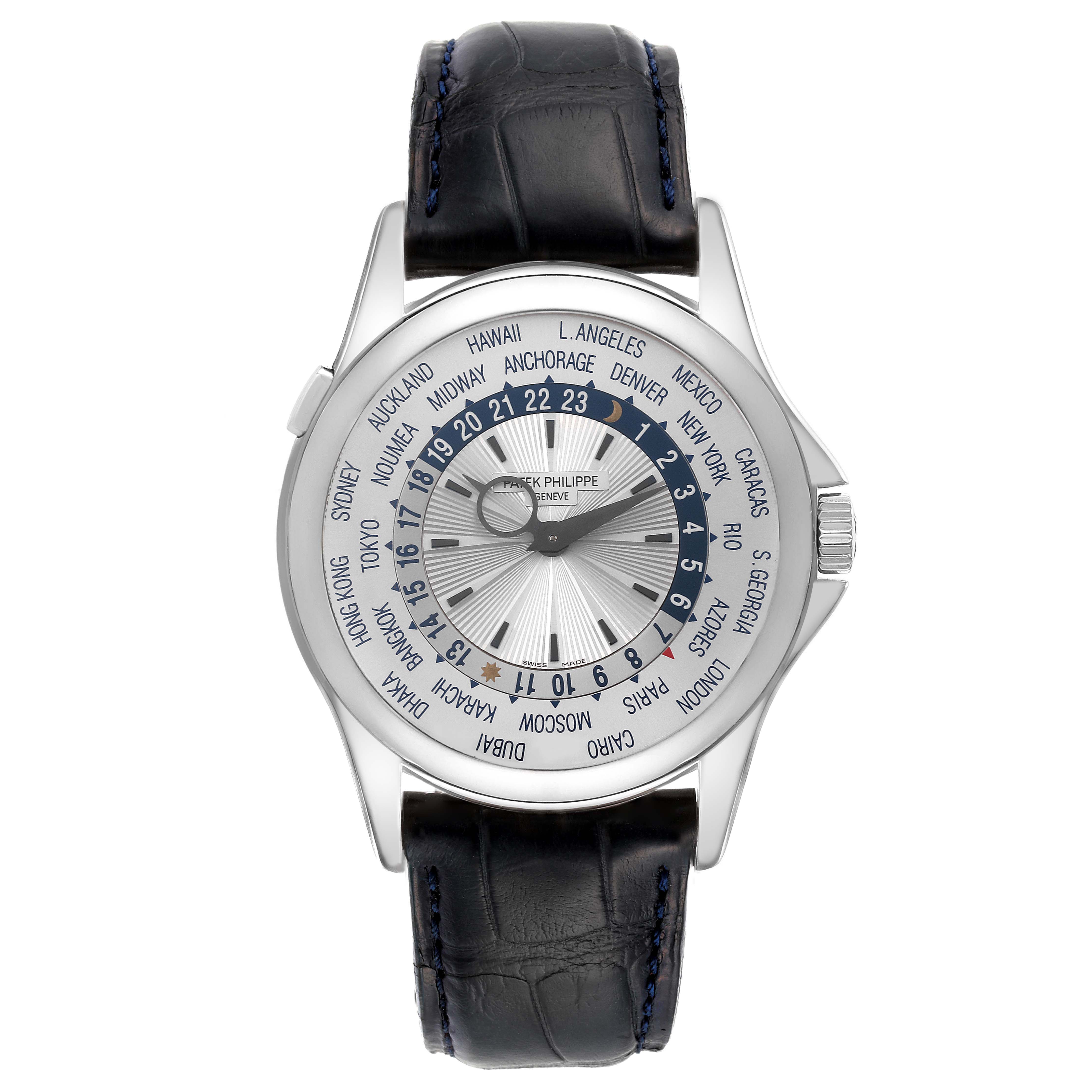 The image shows a front view of the Patek Philippe Complications 5130G Men
s White Gold Silver Dial 5130G Men
s White Gold Silver Dial watch, displaying the face, hands, and surrounding cities.