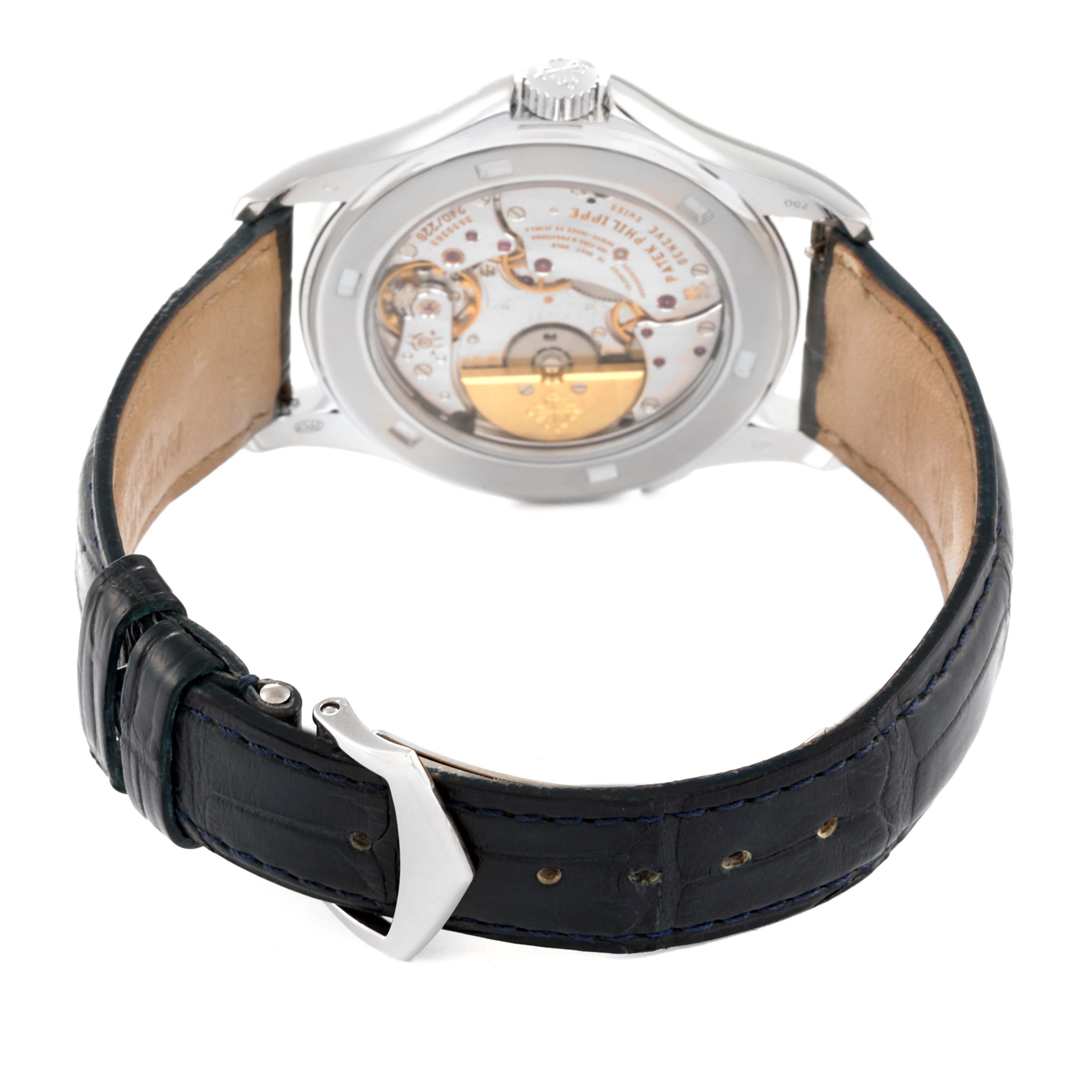 This image shows the back view of a Patek Philippe Complications 5130G Men
s White Gold Silver Dial 5130G Men
s White Gold Silver Dial model, showcasing its movement and leather strap.