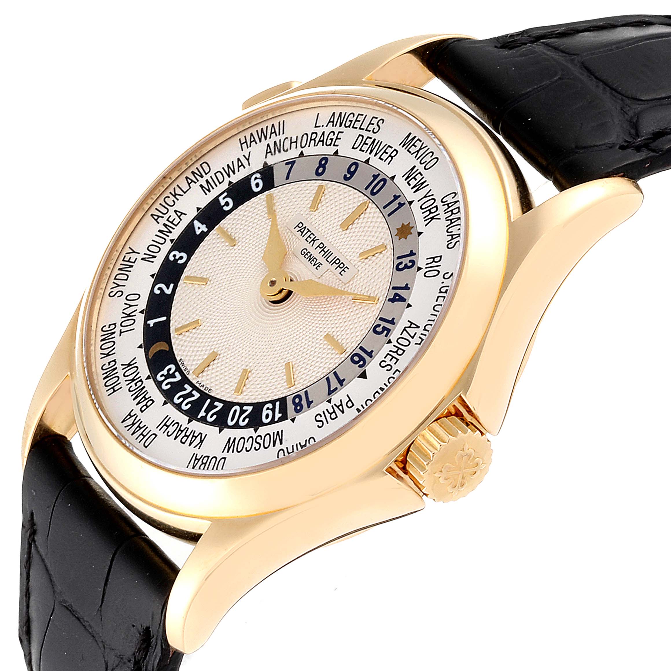 This image shows a Patek Philippe Complications 5110J Men's Yellow Gold Silver Dial 5110J Men's Yellow Gold Silver Dial model watch at a slightly angled view, featuring the dial, crown, and leather strap.