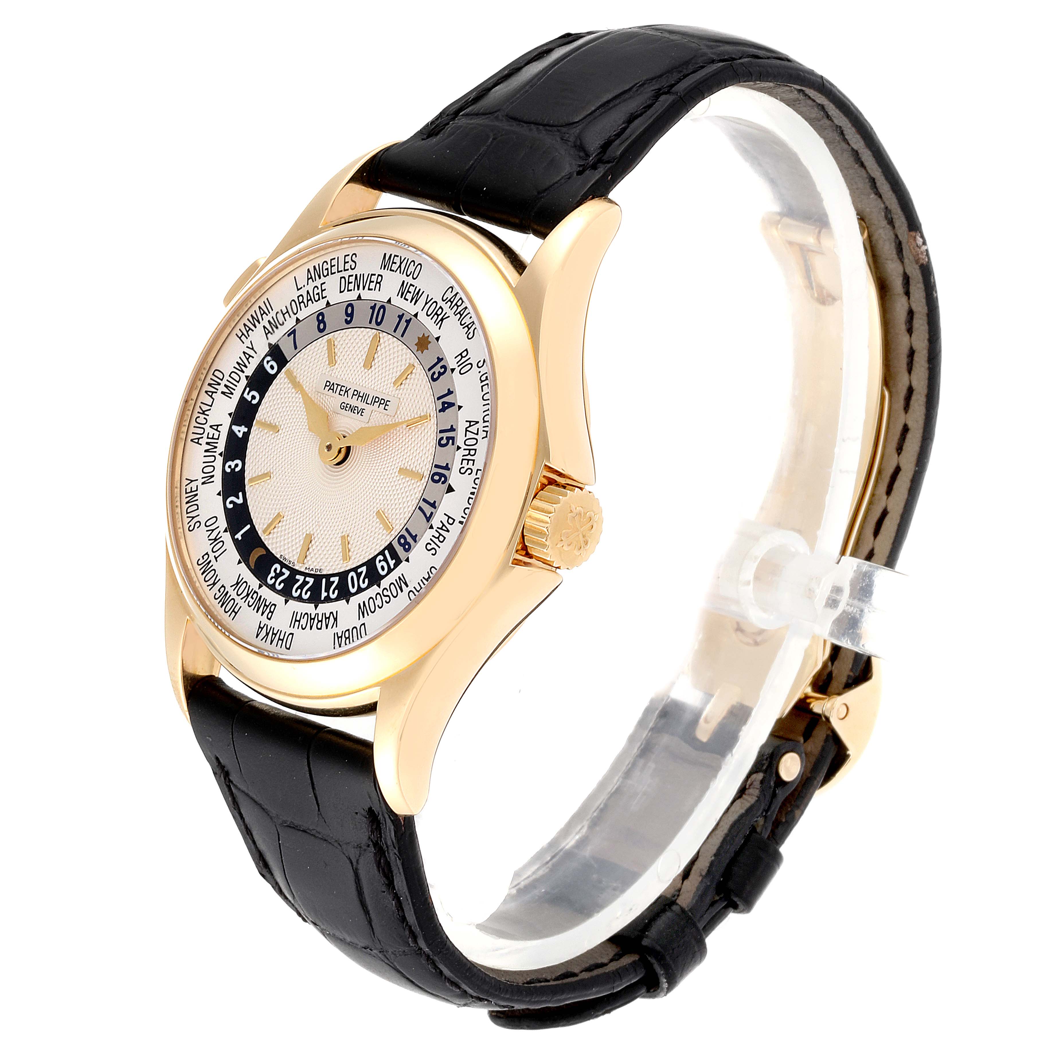 The image shows a side angle of the Patek Philippe Complications 5110J Men's Yellow Gold Silver Dial 5110J Men's Yellow Gold Silver Dial watch, highlighting the bezel, crown, dial, and leather strap.