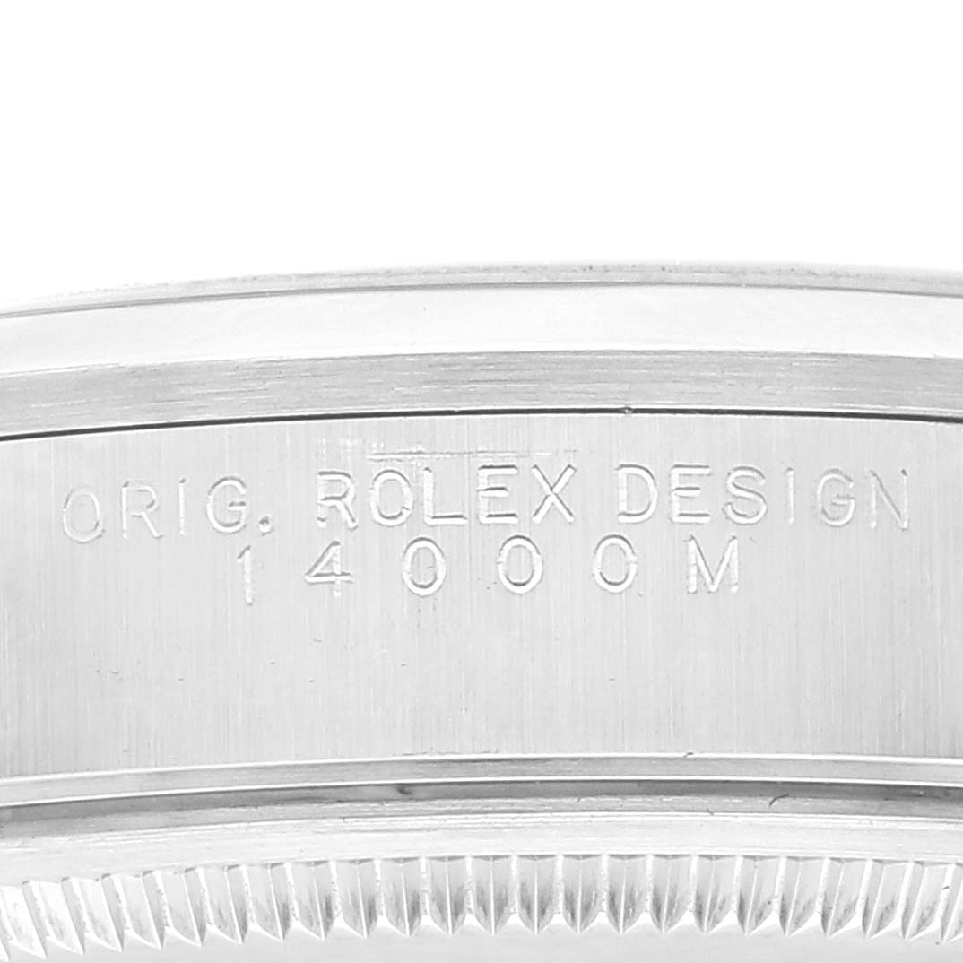 The image shows a close-up of the case side of the Rolex Air-King 14000 Men's Stainless Steel Silver Dial 14000 Men's Stainless Steel Silver Dial watch, displaying its engraved design number.