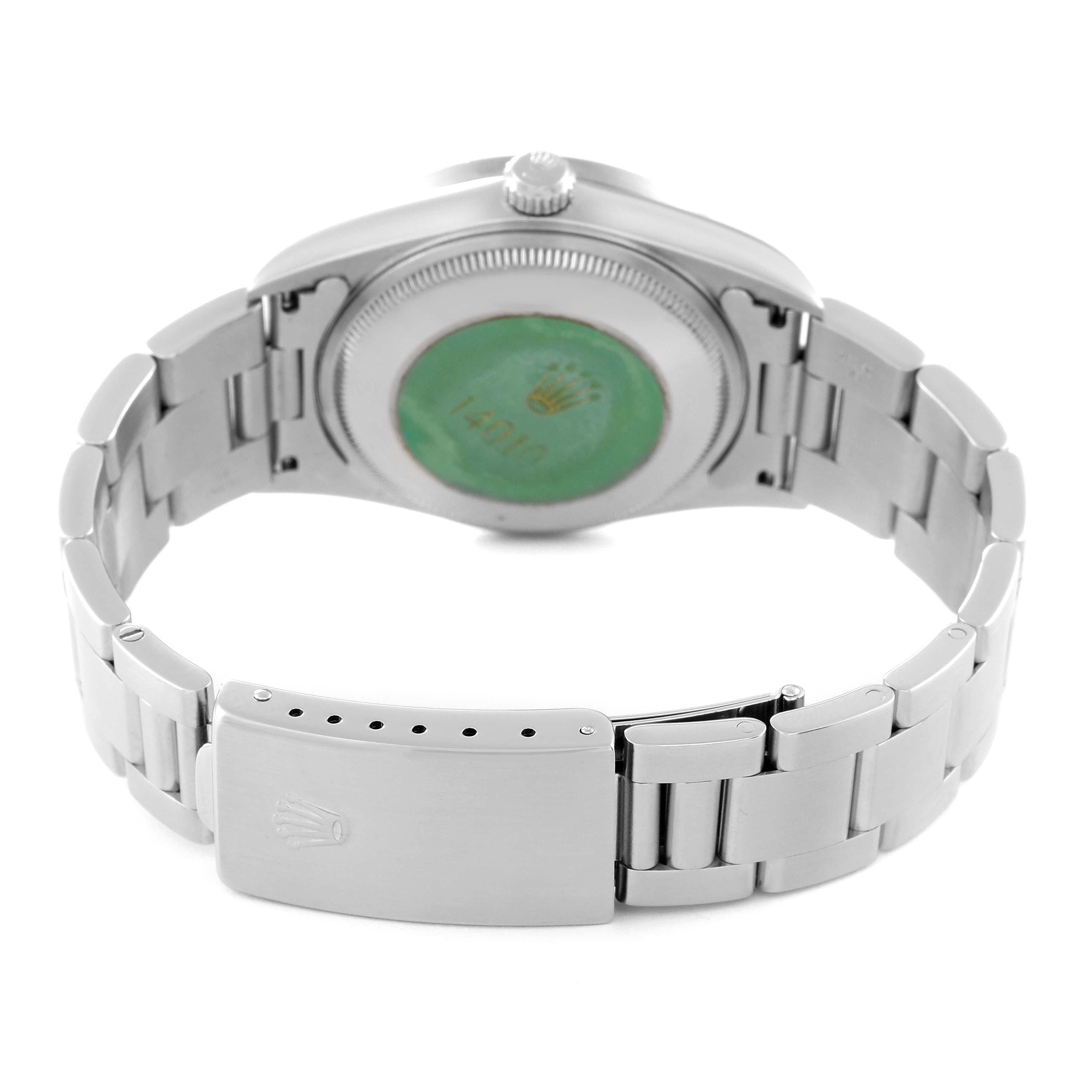 The image shows the back view of a Rolex Air-King 14010 Men's Stainless Steel Black Dial 14010 Men's Stainless Steel Black Dial watch, highlighting the clasp and case back.