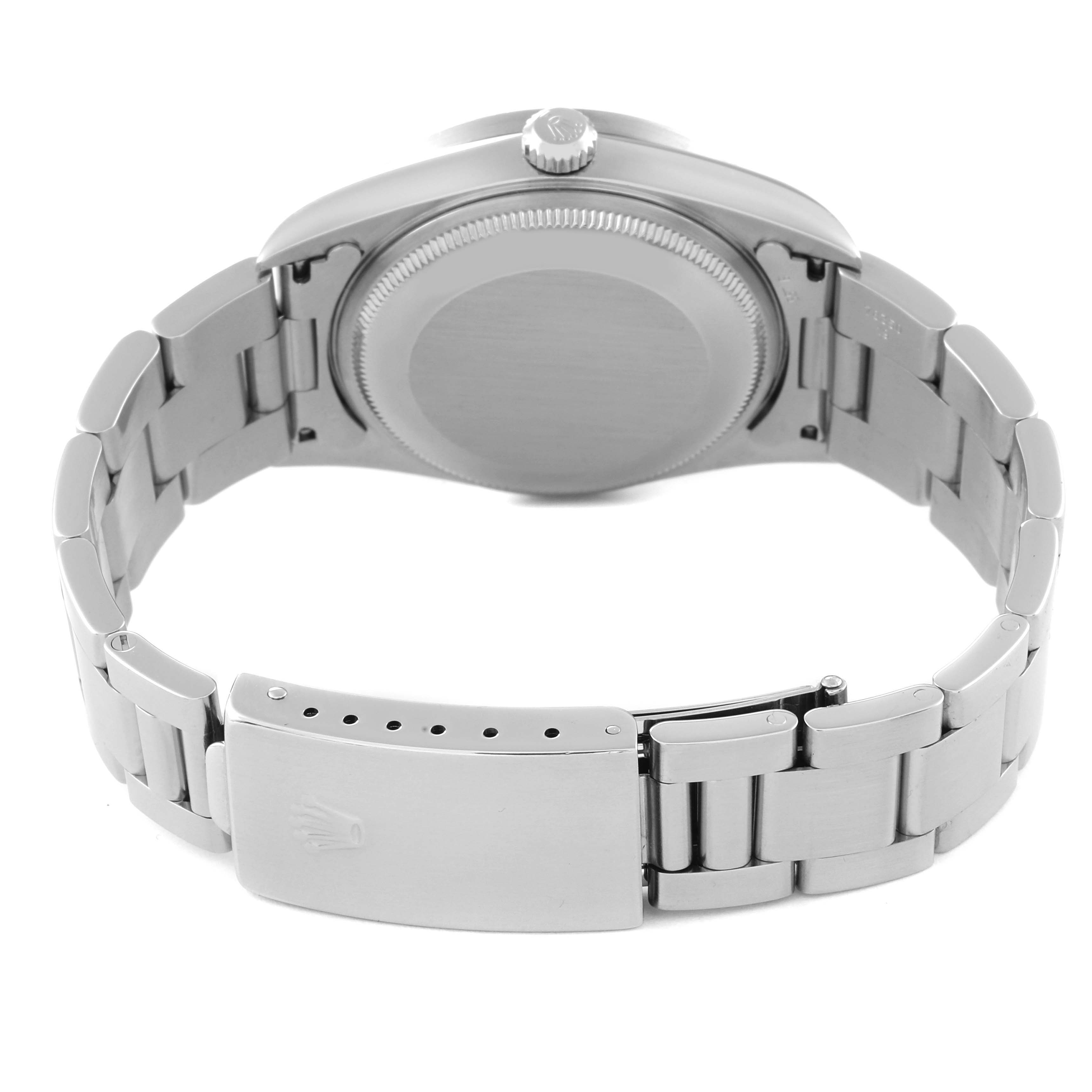 This image shows the back view of a Rolex Air-King 14010 Men's Stainless Steel Silver Dial 14010 Men's Stainless Steel Silver Dial watch, featuring the case back, crown, and bracelet with clasp.