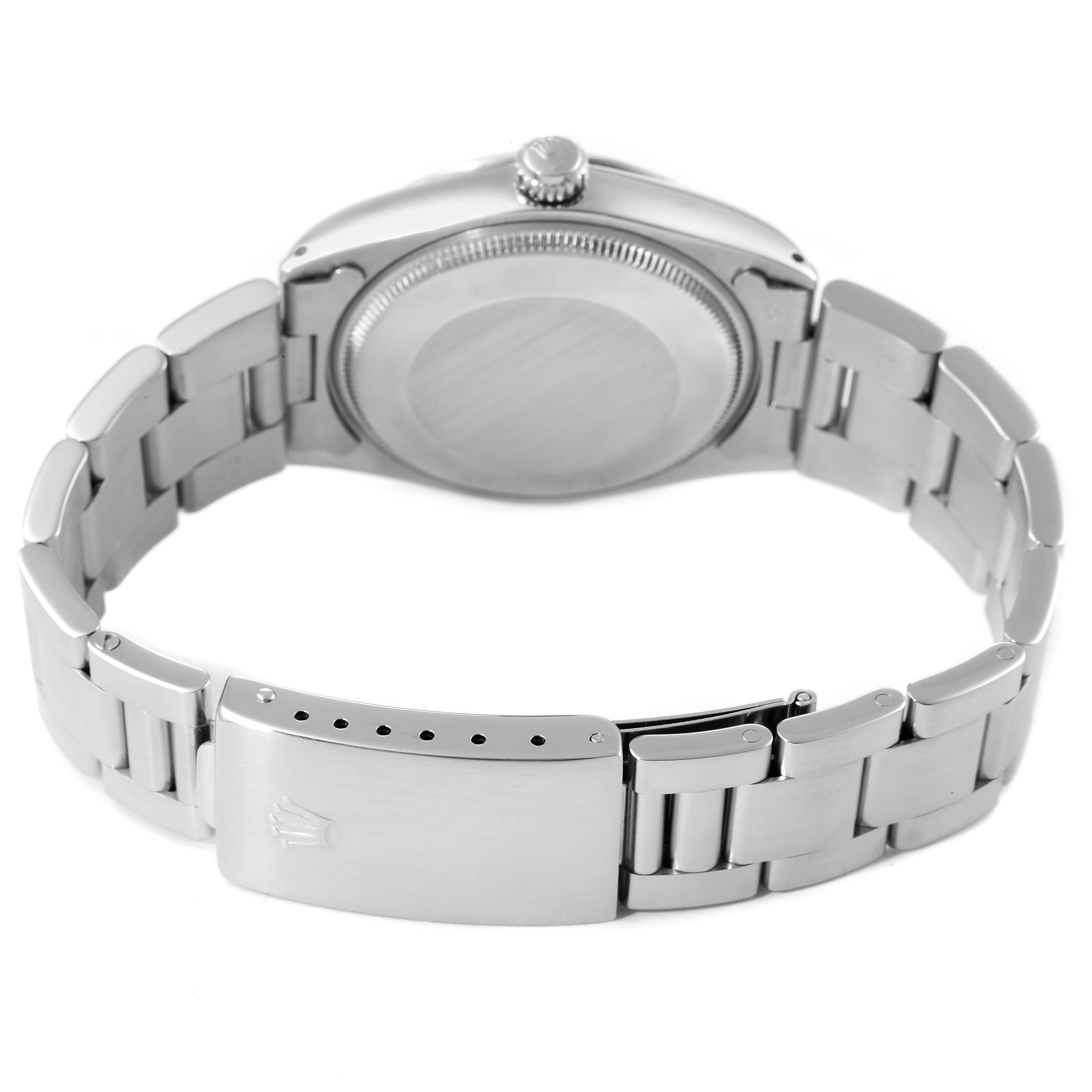 The image shows the back and clasp of a Rolex Vintage Collection 5500 Men
s Stainless Steel Silver Dial 5500 Men
s Stainless Steel Silver Dial watch, presented in a partially open state.