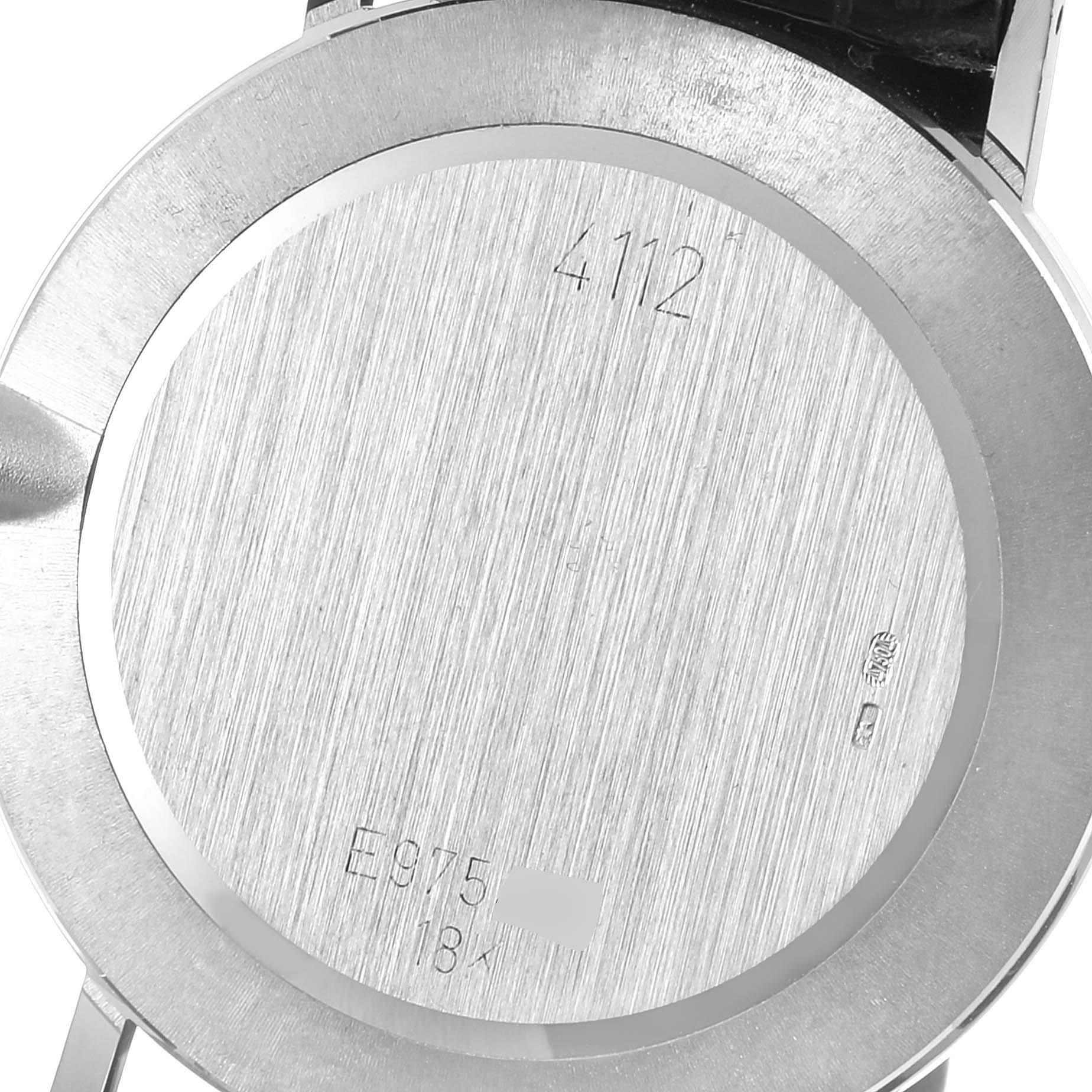 This image shows the back case of a Rolex Cellini 4112 Men's Stainless Steel Silver Dial 4112 Men's Stainless Steel Silver Dial watch, highlighting etchings and material details.
