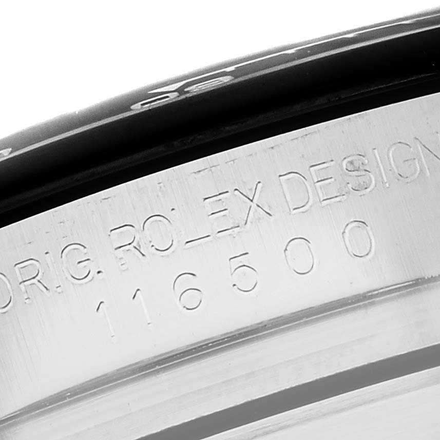 The image shows a close-up view of the model and design engraving on the side of the case of a Rolex Daytona 116500 Men's Stainless Steel Black Dial 116500 Men's Stainless Steel Black Dial watch.