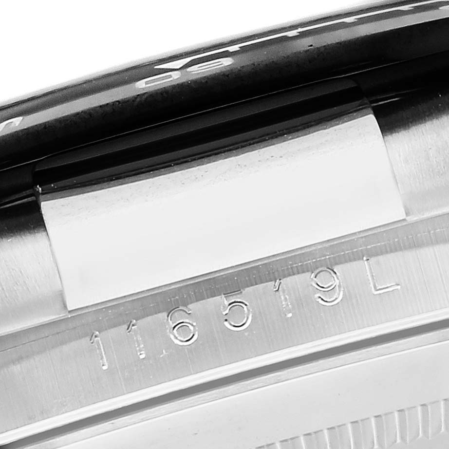 The image shows a close-up of the watch case's edge and serial number of a Rolex Yacht-Master model.