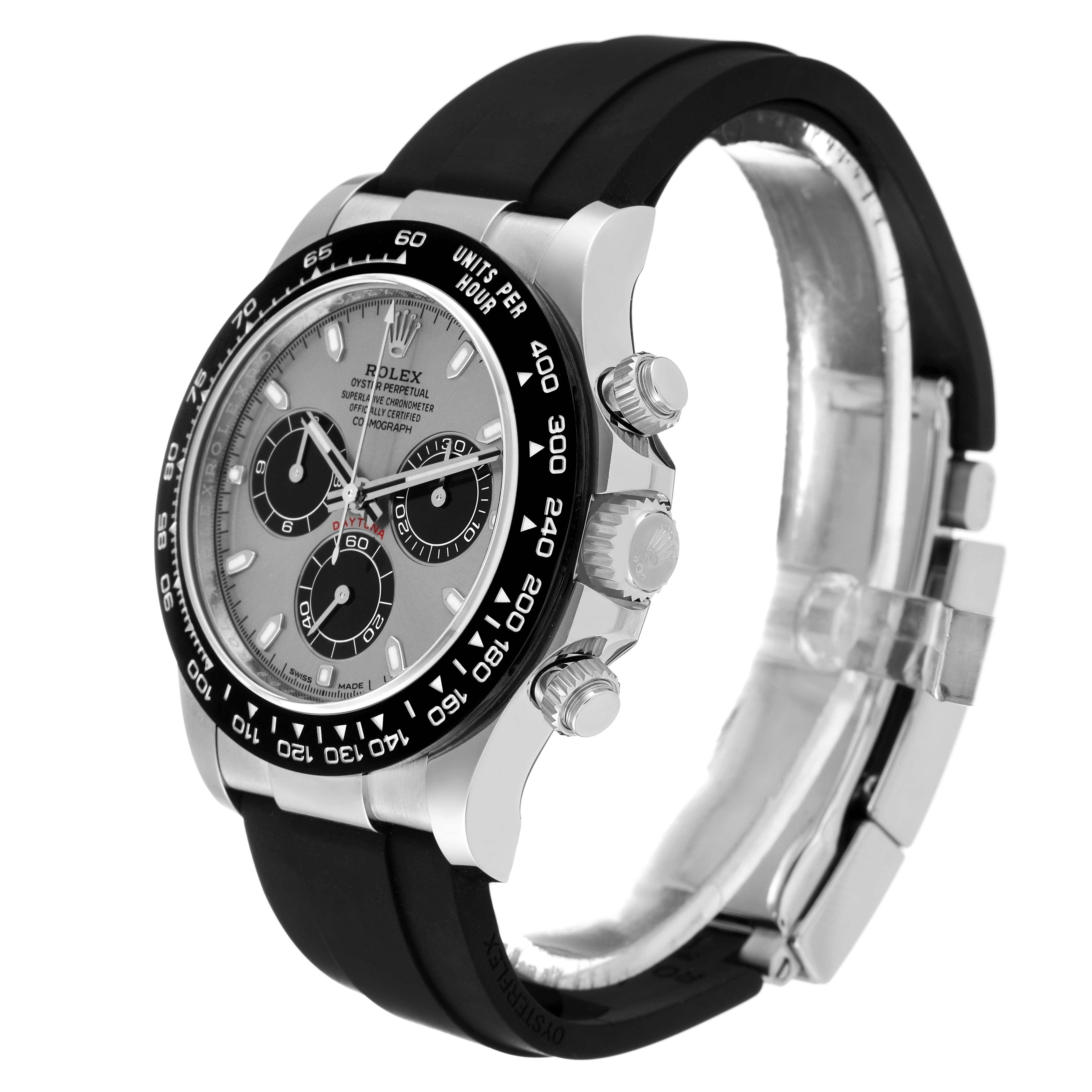 The Rolex Yacht-Master watch is shown from an angled side view, displaying its face, crown, pushers, and black rubber strap.