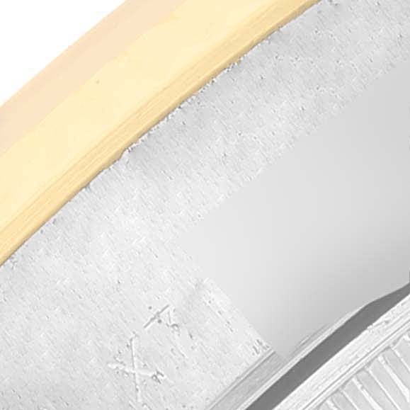 This image shows a macro view of the case edge and bezel of a Rolex Datejust 69173 Women's Steel and Gold (two tone) Champagne Dial 69173 Women's Steel and Gold (two tone) Champagne Dial watch.