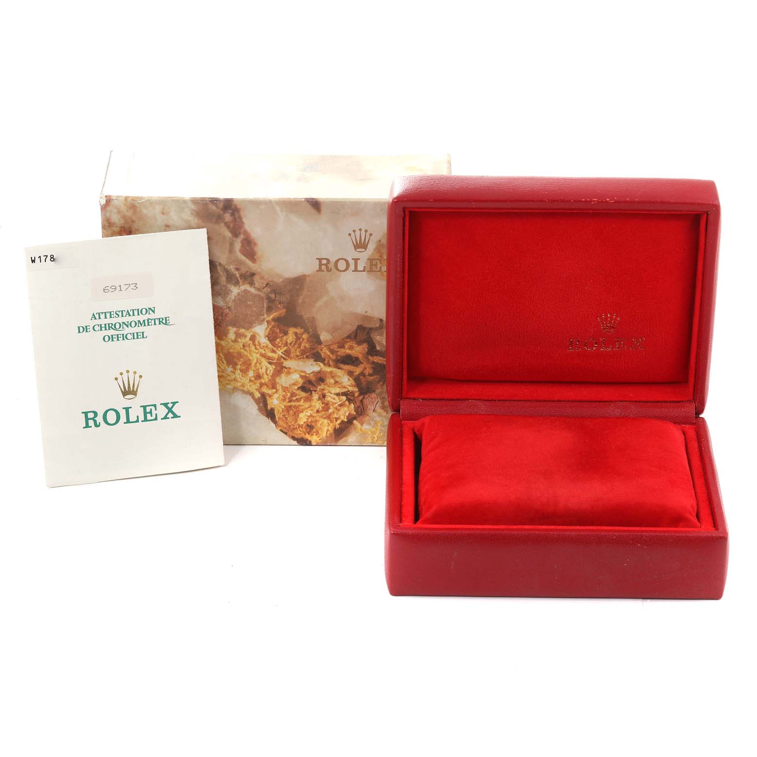 The image shows a red Rolex watch box, outer packaging, and an attestation booklet for the Rolex Datejust 69173 Women's Steel and Gold (two tone) Champagne Dial 69173 Women's Steel and Gold (two tone) Champagne Dial model.