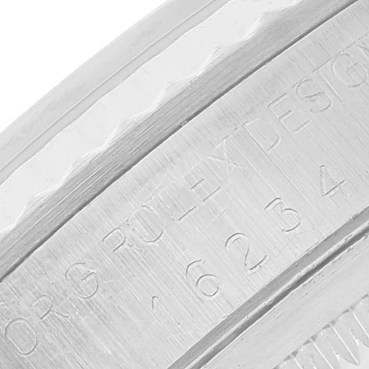 This image shows a close-up of the inner bezel with engravings on a Rolex Datejust 16234 Men's Stainless Steel Black Dial 16234 Men's Stainless Steel Black Dial watch.