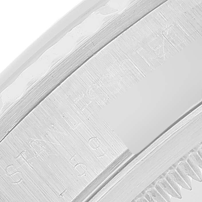 The image shows a close-up of the bezel and case edge of a Rolex Datejust 16234 Men's Stainless Steel Black Dial 16234 Men's Stainless Steel Black Dial watch.