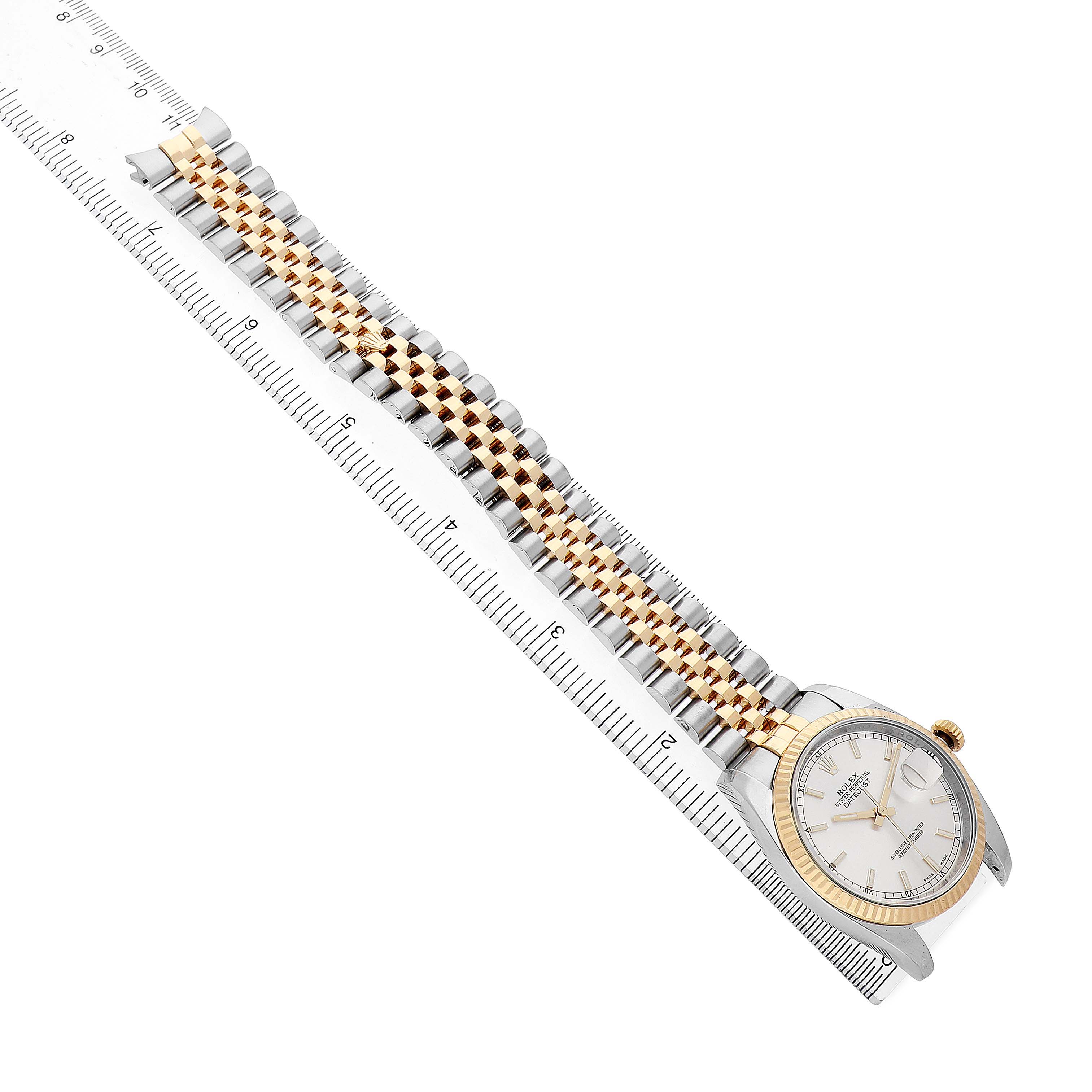 The Rolex Datejust 116233 Men's Stainless Steel Silver Dial watch is shown from an elevated angle, featuring its full bracelet, bezel, and dial.