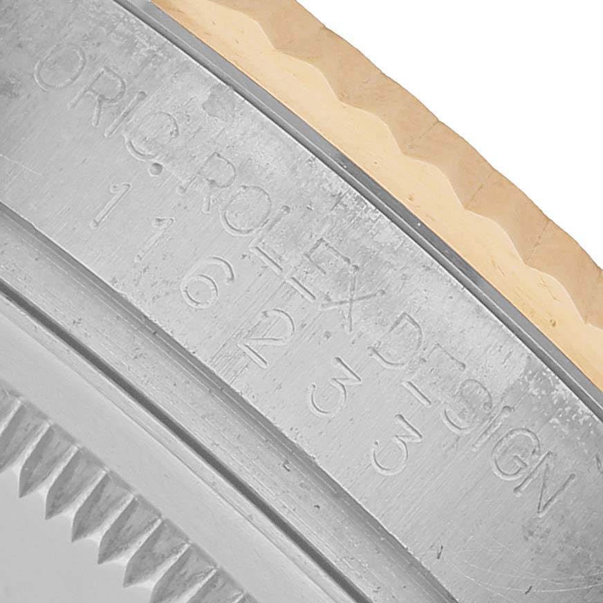 The image focuses on the side engraving of a Rolex Datejust 116233 Men's Stainless Steel Silver Dial watch, showing the model and design details.