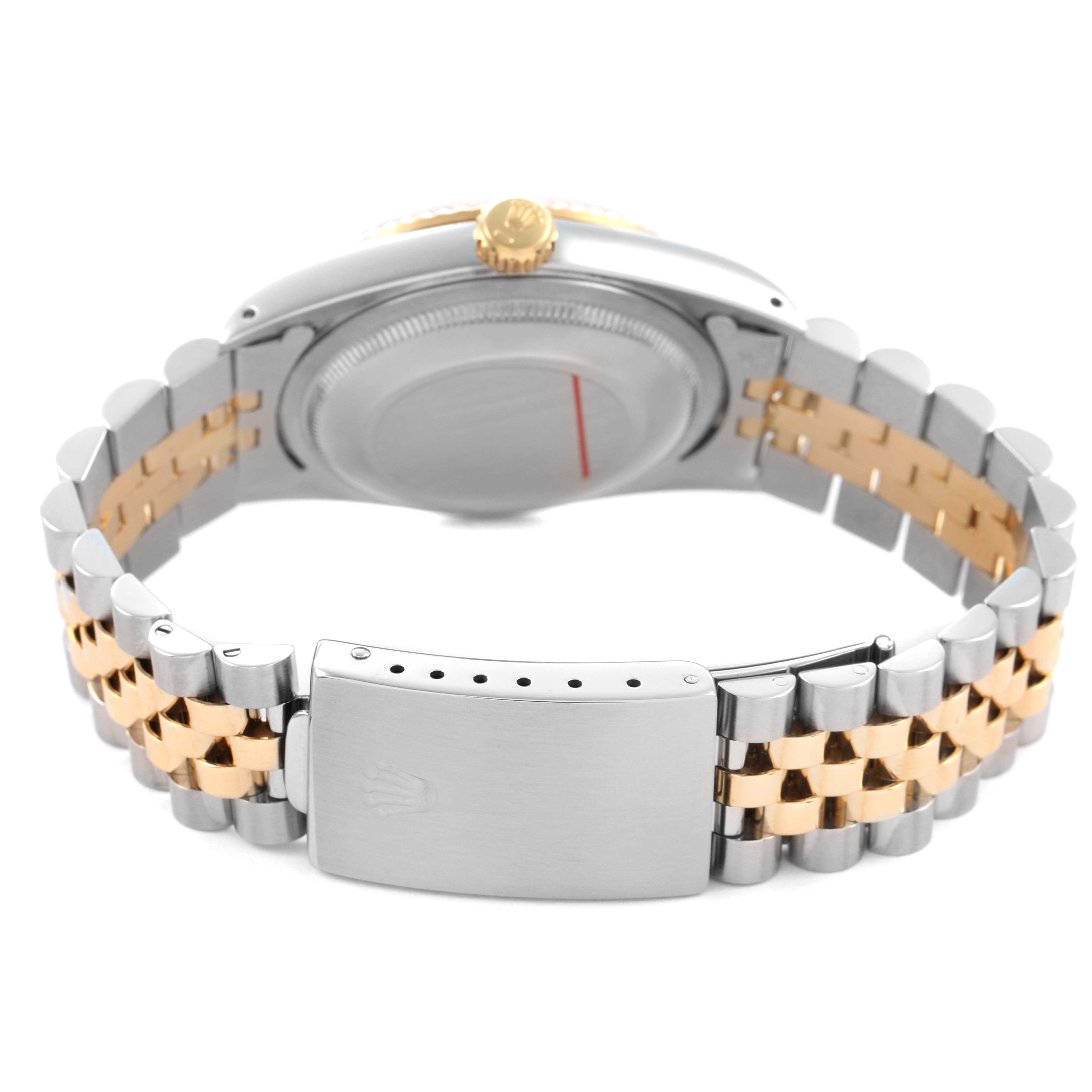 The image shows the back view of a Rolex Datejust 16233 Men's Steel and Gold (two tone) White Dial, highlighting the case back, crown, and two-tone bracelet with clasp.