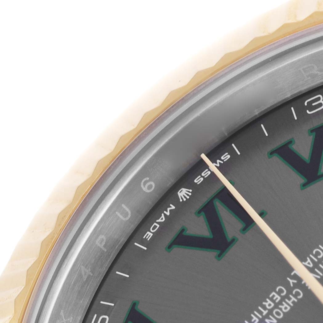 The image shows a close-up of the Rolex Datejust 41 126333 Men's Steel and Gold (two tone) Grey Dial's dial, highlighting the bezel and part of the hour markers.