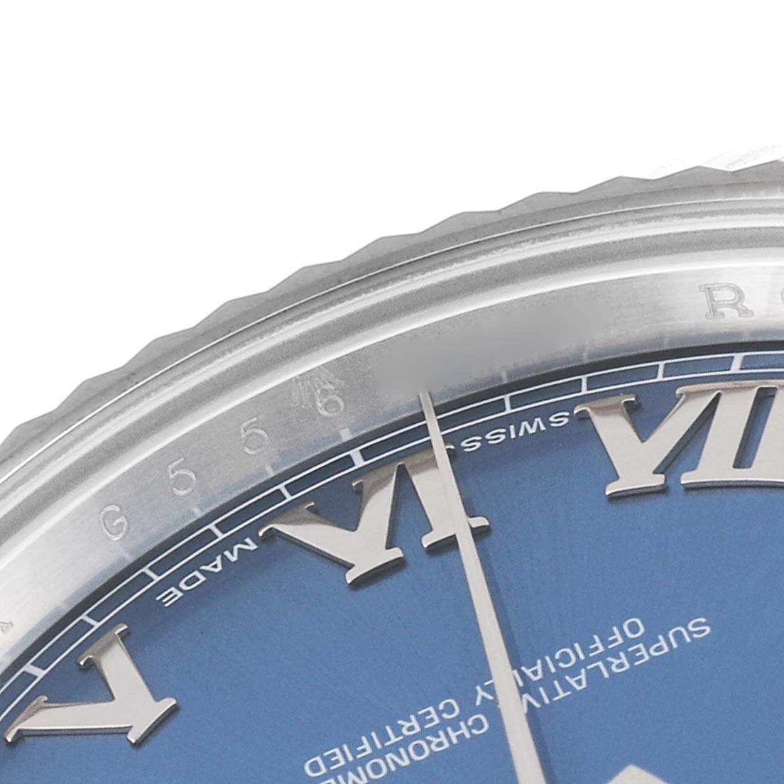 The image shows a close-up angle of the dial, bezel, and markers of the Rolex Datejust 41 116334 Men
s Stainless Steel Blue Dial 116334 Men
s Stainless Steel Blue Dial watch.