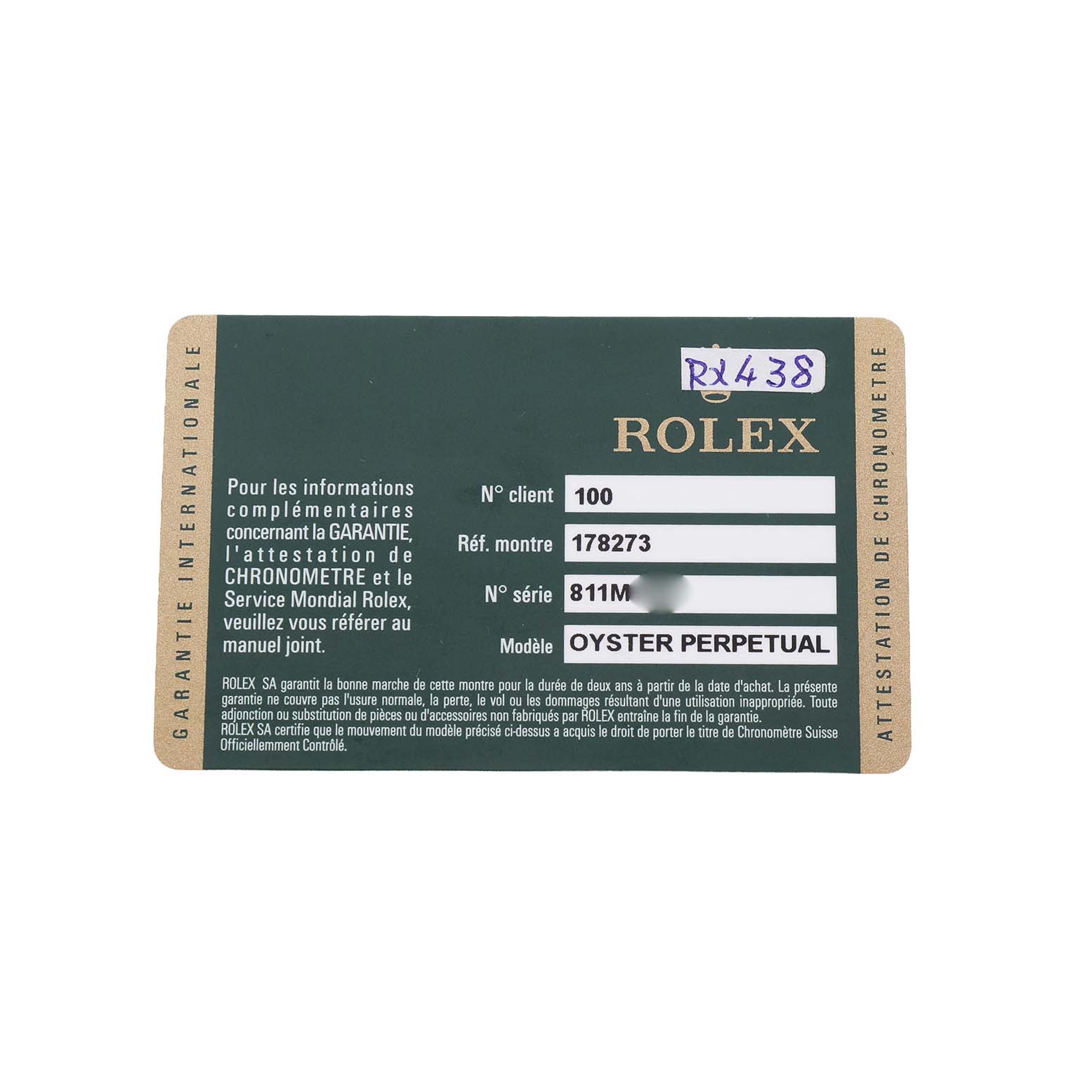 The image shows a Rolex Oyster Perpetual warranty card viewed from above.