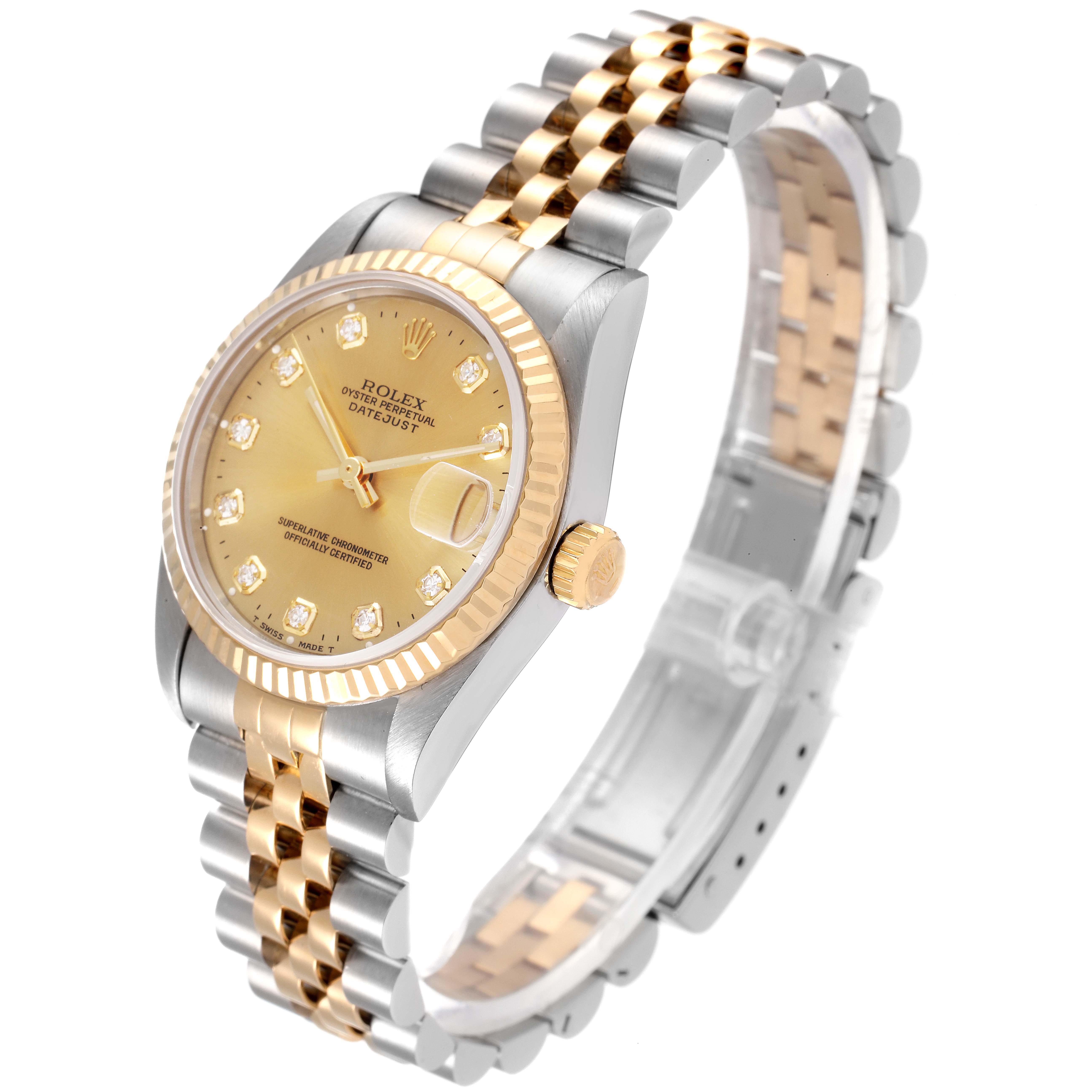This Rolex Mid-Size 68273 Women's Steel and Gold (two tone) Champagne Dial 68273 Women's Steel and Gold (two tone) Champagne Dial model watch is shown at a three-quarter angle, highlighting its gold dial, bezel, and two-tone bracelet.