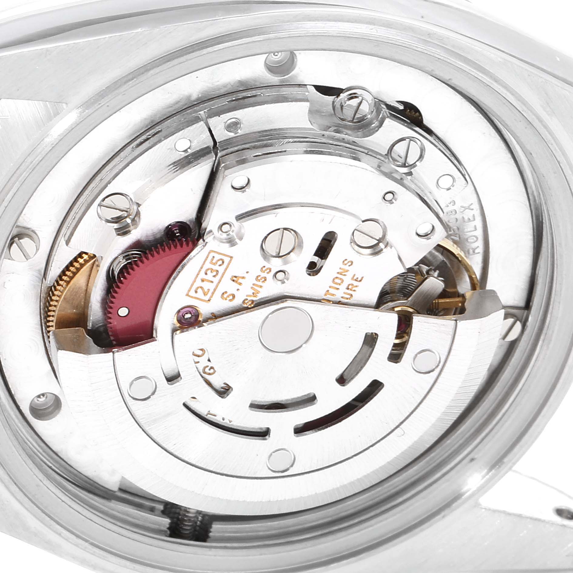 The image shows the internal mechanical movement of a Mid-Size Rolex watch from the back angle.