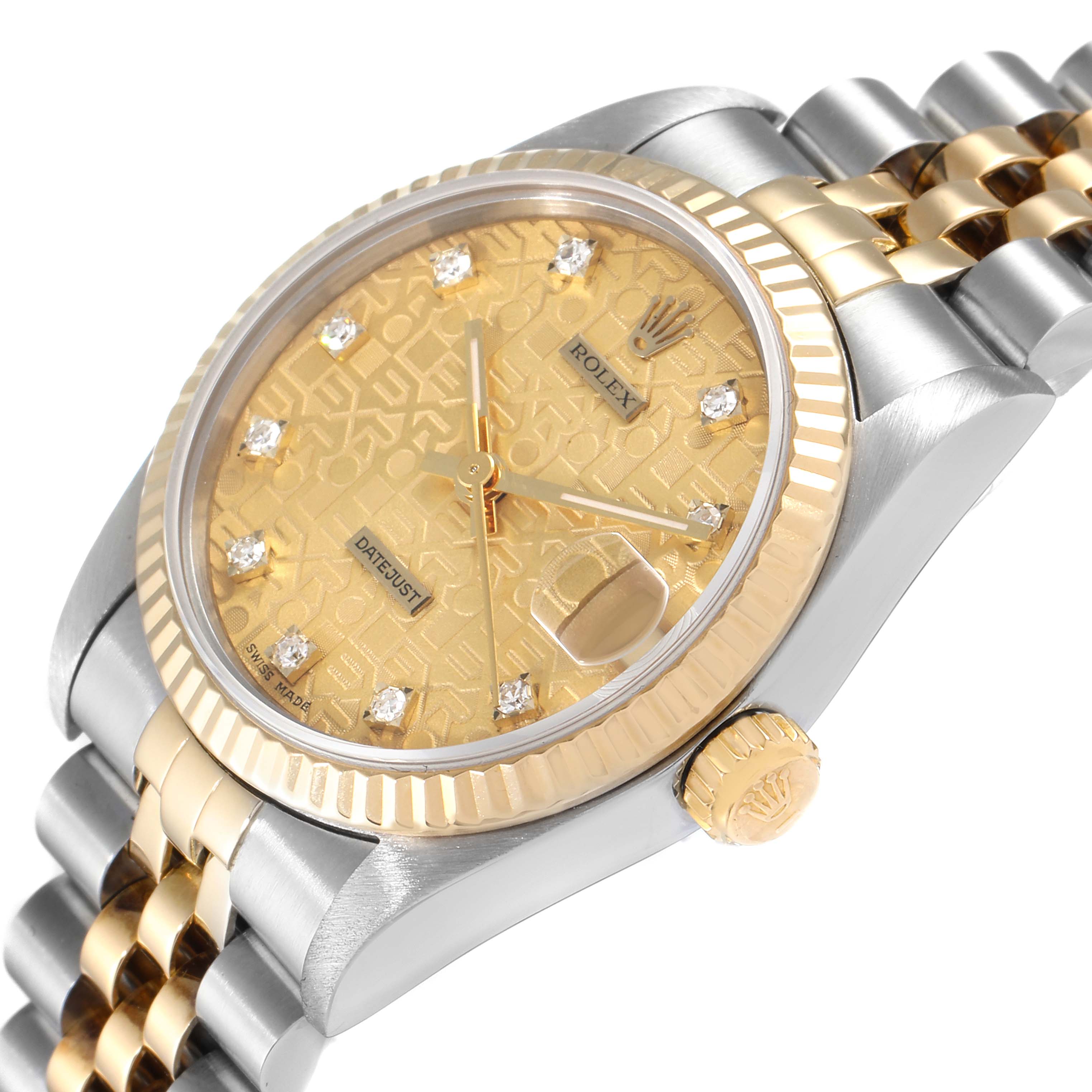 This image shows a Rolex Mid-Size 68273 Women's Steel and Gold (two tone) Champagne Dial 68273 Women's Steel and Gold (two tone) Champagne Dial Datejust watch, highlighting its gold dial, fluted bezel, and two-tone bracelet from a slight angle.