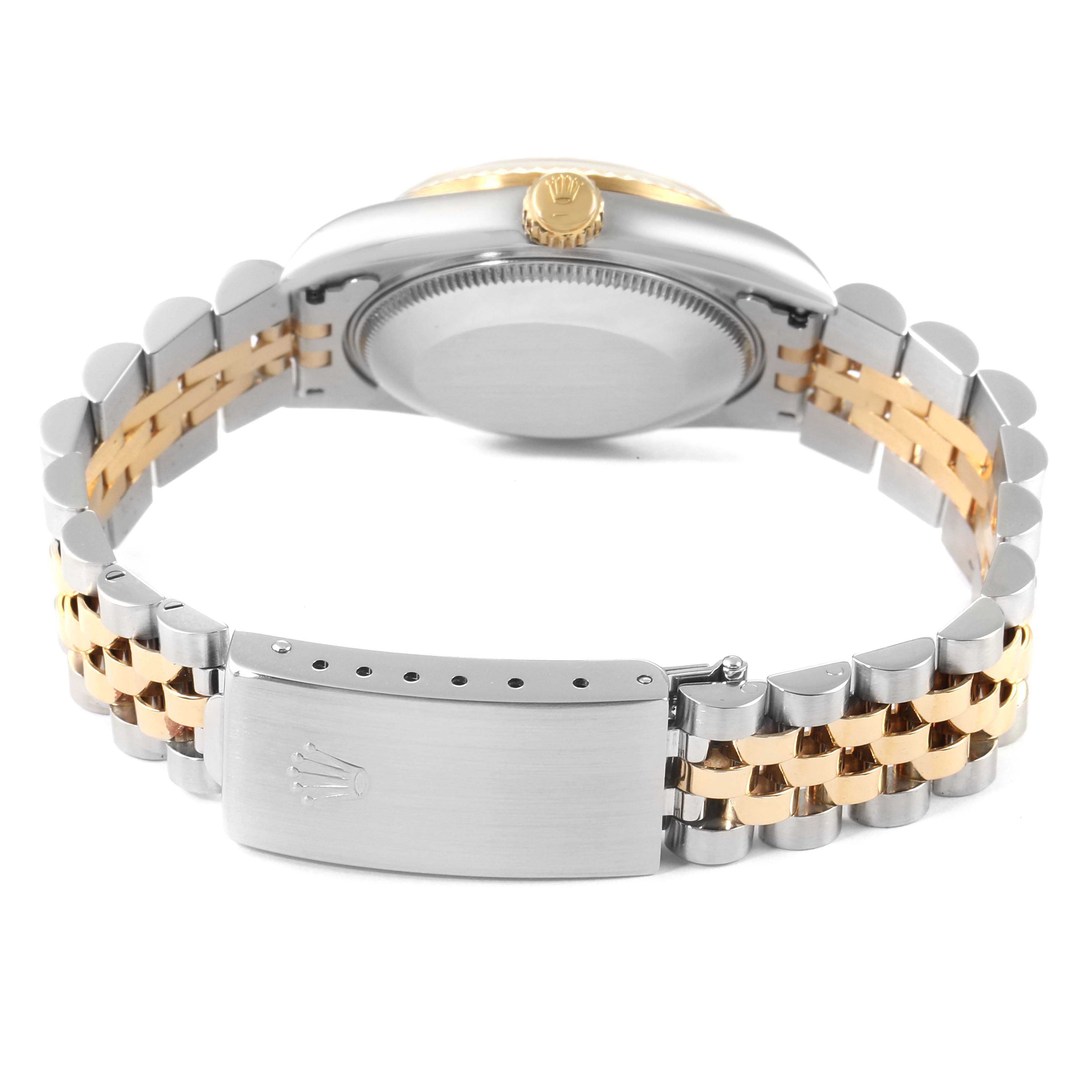 The image shows the backside of a Rolex Mid-Size 68273 Women's Steel and Gold (two tone) Champagne Dial 68273 Women's Steel and Gold (two tone) Champagne Dial watch, highlighting the bracelet, clasp, and case.