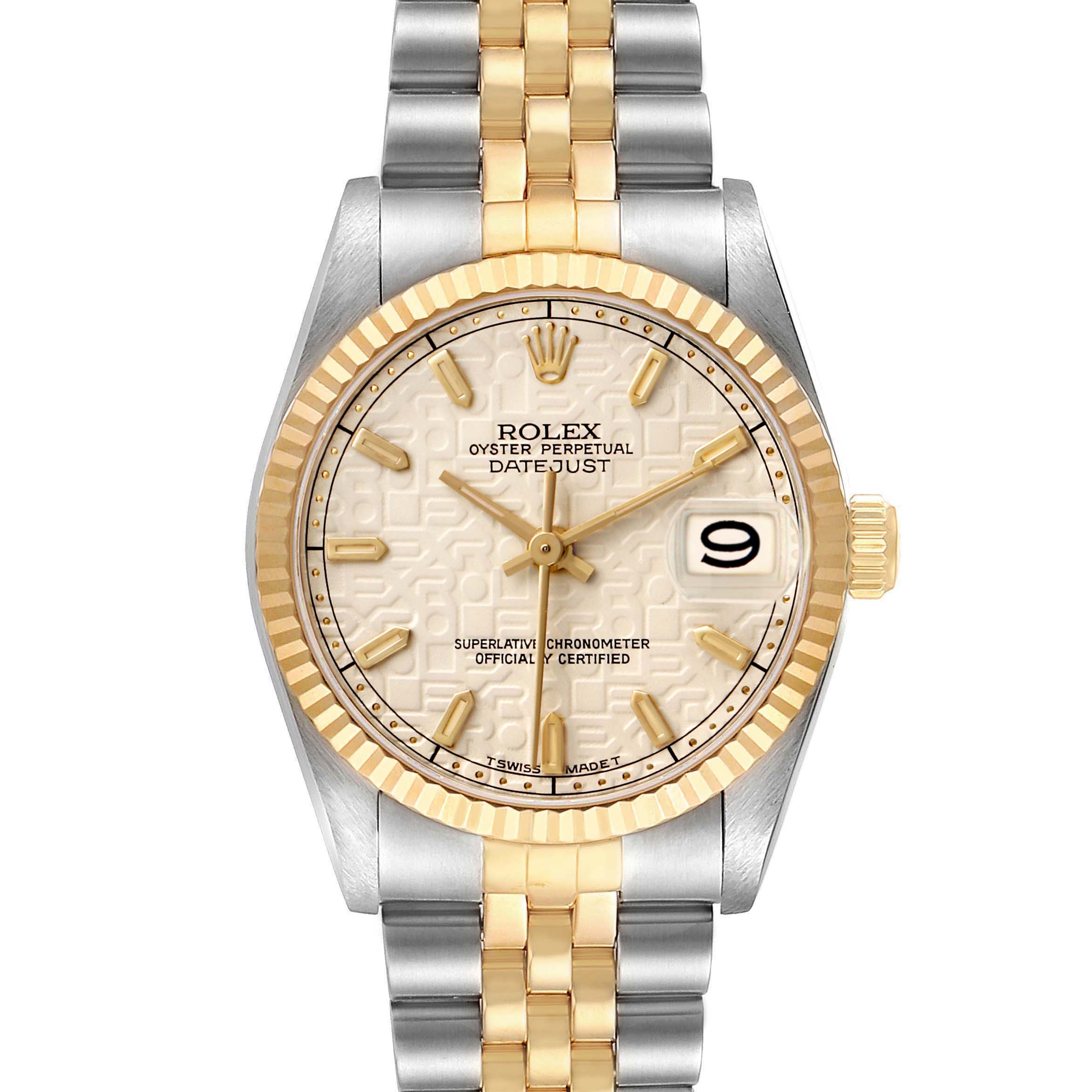 The Rolex Mid-Size 68273 Women's Steel and Gold (two tone) White Dial model is shown from a frontal perspective, displaying the dial, bezel, and part of the bracelet.