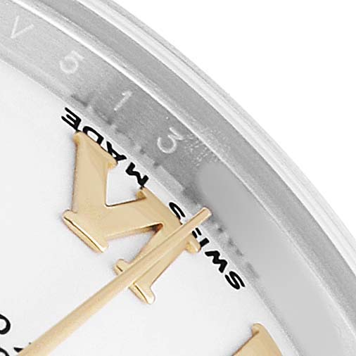 The image shows a close-up of the Rolex Mid-Size 178243 Women's Stainless Steel White Dial watch dial, focusing on the hands, edge, and partial numerals.