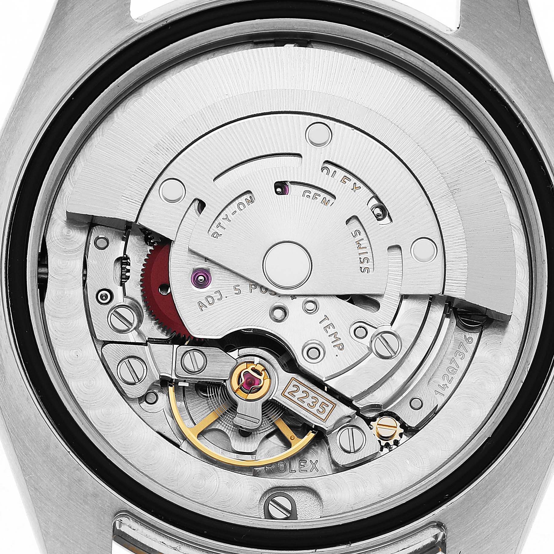 The image shows the movement mechanism of a Rolex Mid-Size 178243 Women's Stainless Steel White Dial watch from a rear angle.