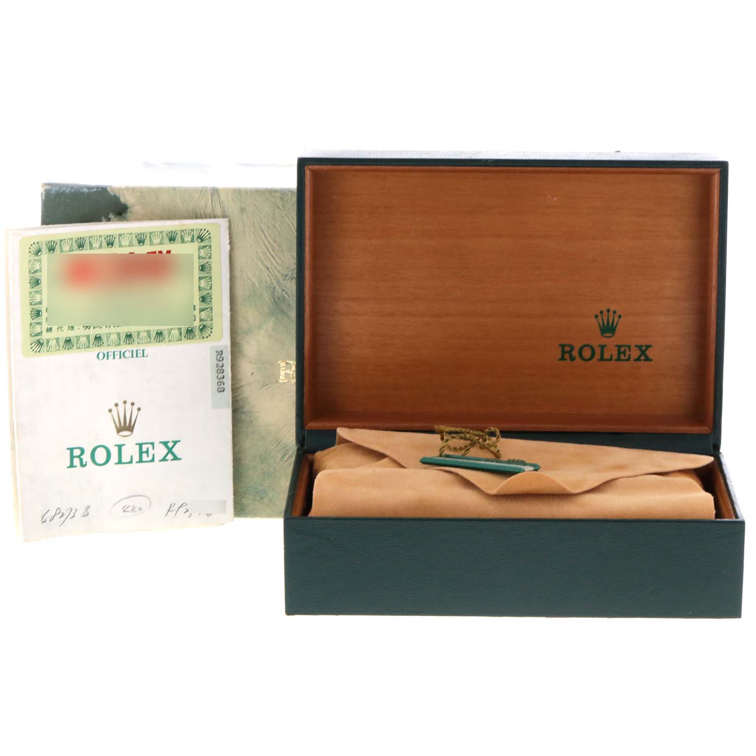 This image shows an open Rolex Mid-Size 68273 Women's Steel and Gold (two tone) Grey Dial 68273 Women's Steel and Gold (two tone) Grey Dial model box with its certificate beside it.