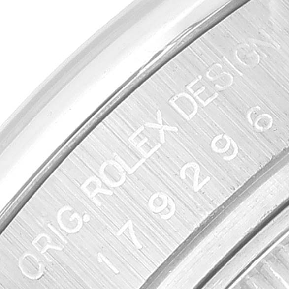This is a close-up of the serial number engraving on the edge of a Rolex President 179296 Women's Platinum Silver Dial 179296 Women's Platinum Silver Dial model watch.