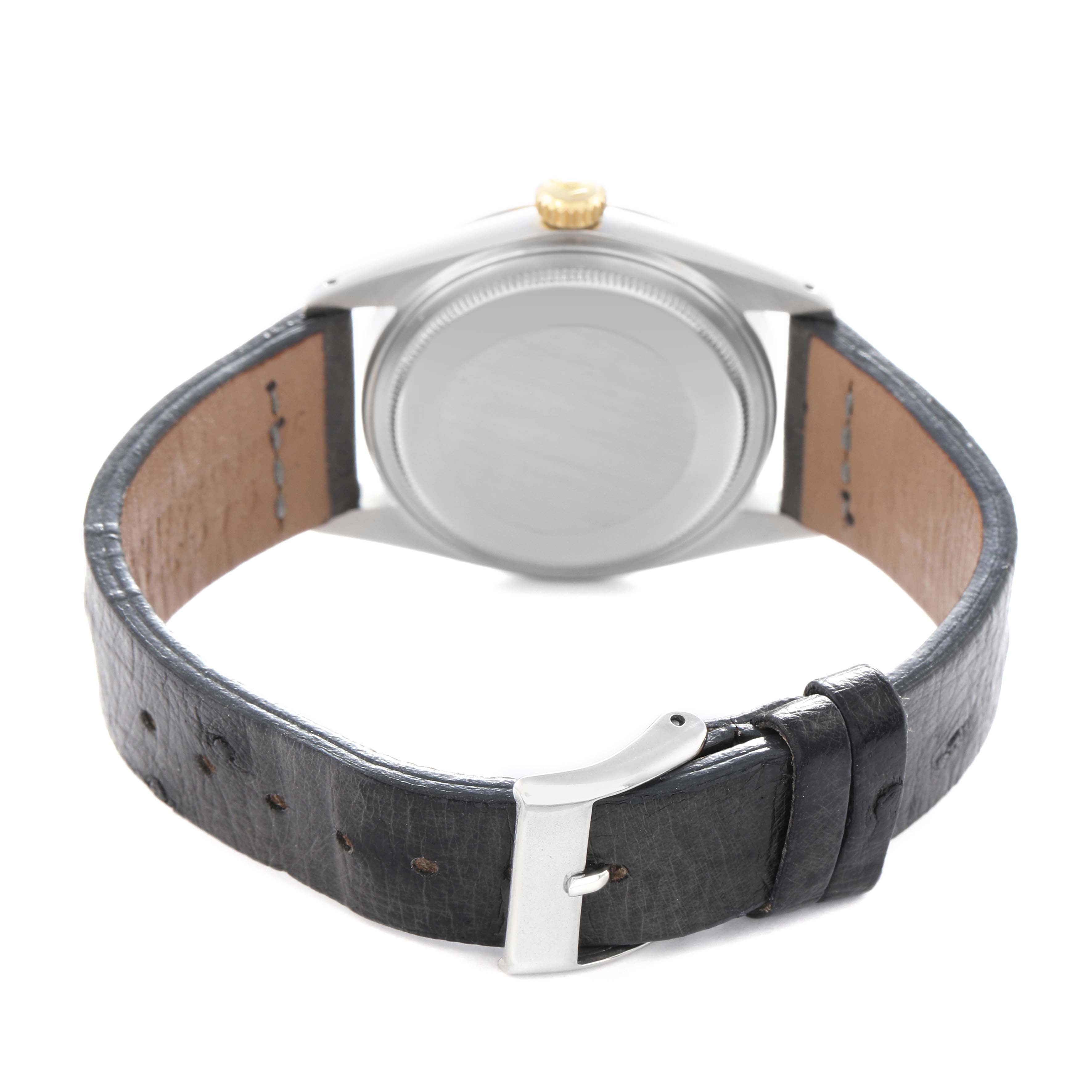 The image shows the back and side of a Rolex Datejust model 16013 Men
s watch, focusing on the case back, crown, and leather strap with a buckle.