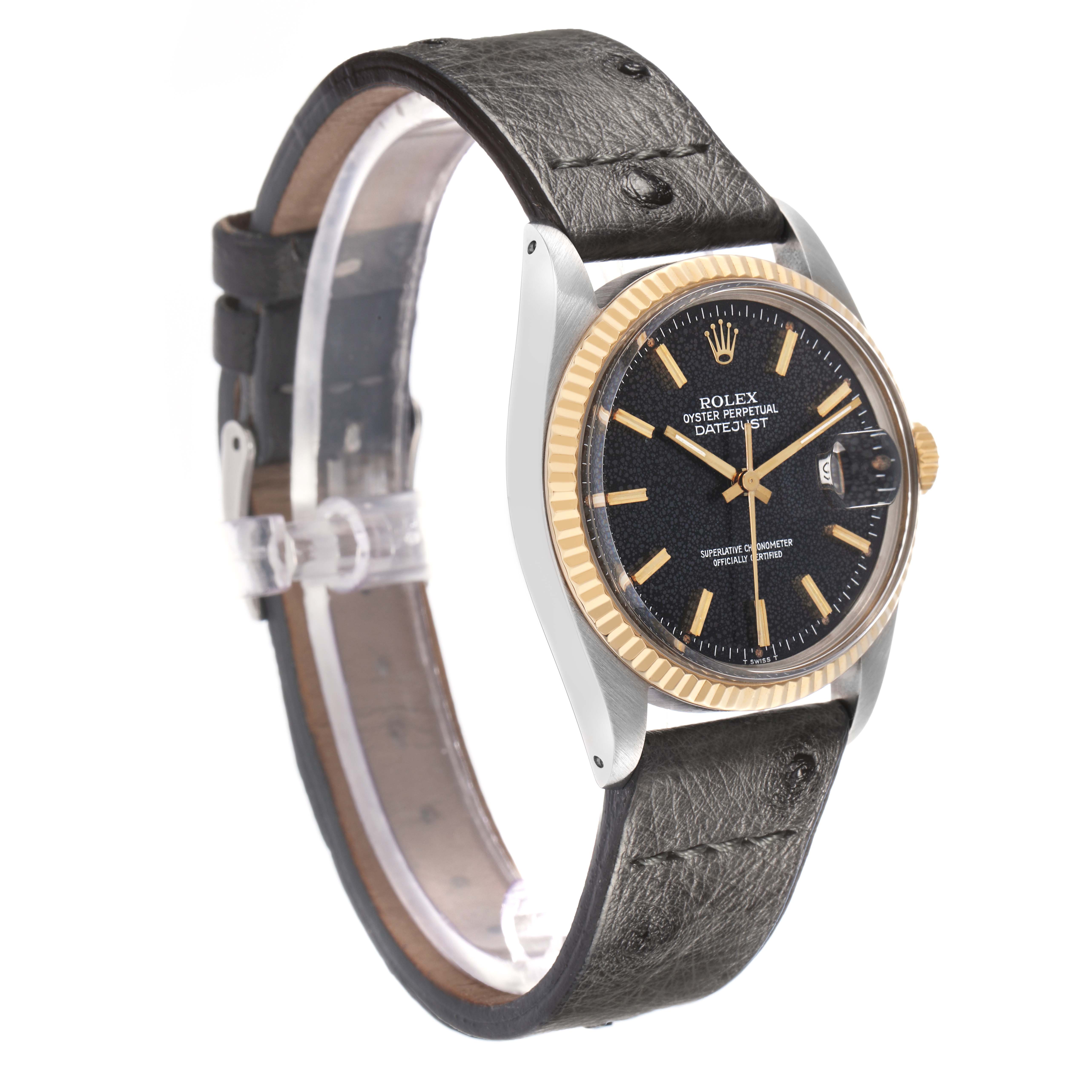 The image shows a Rolex Datejust model 16013 men
s watch at a three-quarter angle, highlighting the black dial, gold fluted bezel, and leather strap.