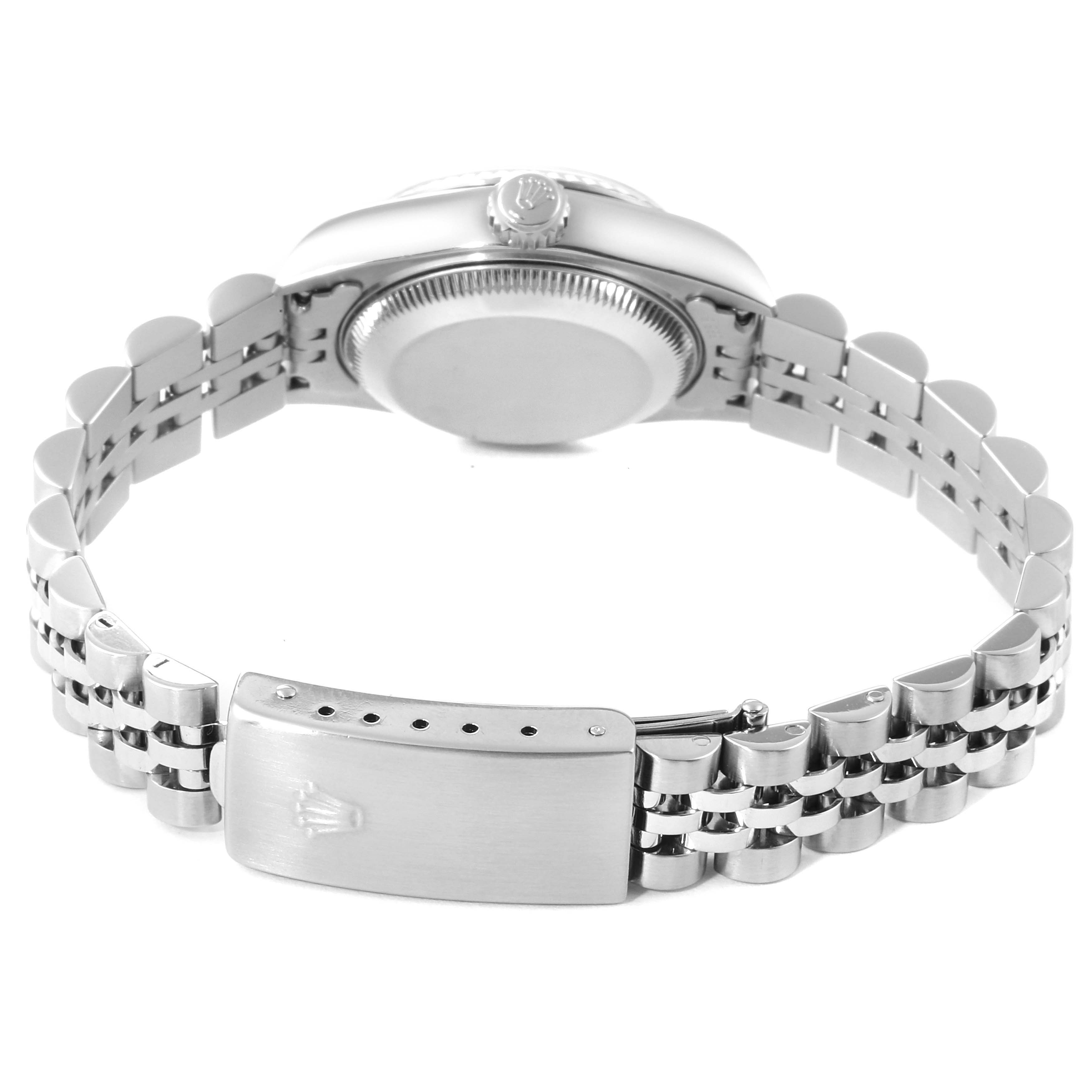 This image shows the back of a Rolex Datejust 79174 Women
s Stainless Steel Mother of Pearl Dial 79174 Women
s Stainless Steel Mother of Pearl Dial watch, highlighting its case back, crown, and oyster bracelet with a clasp.