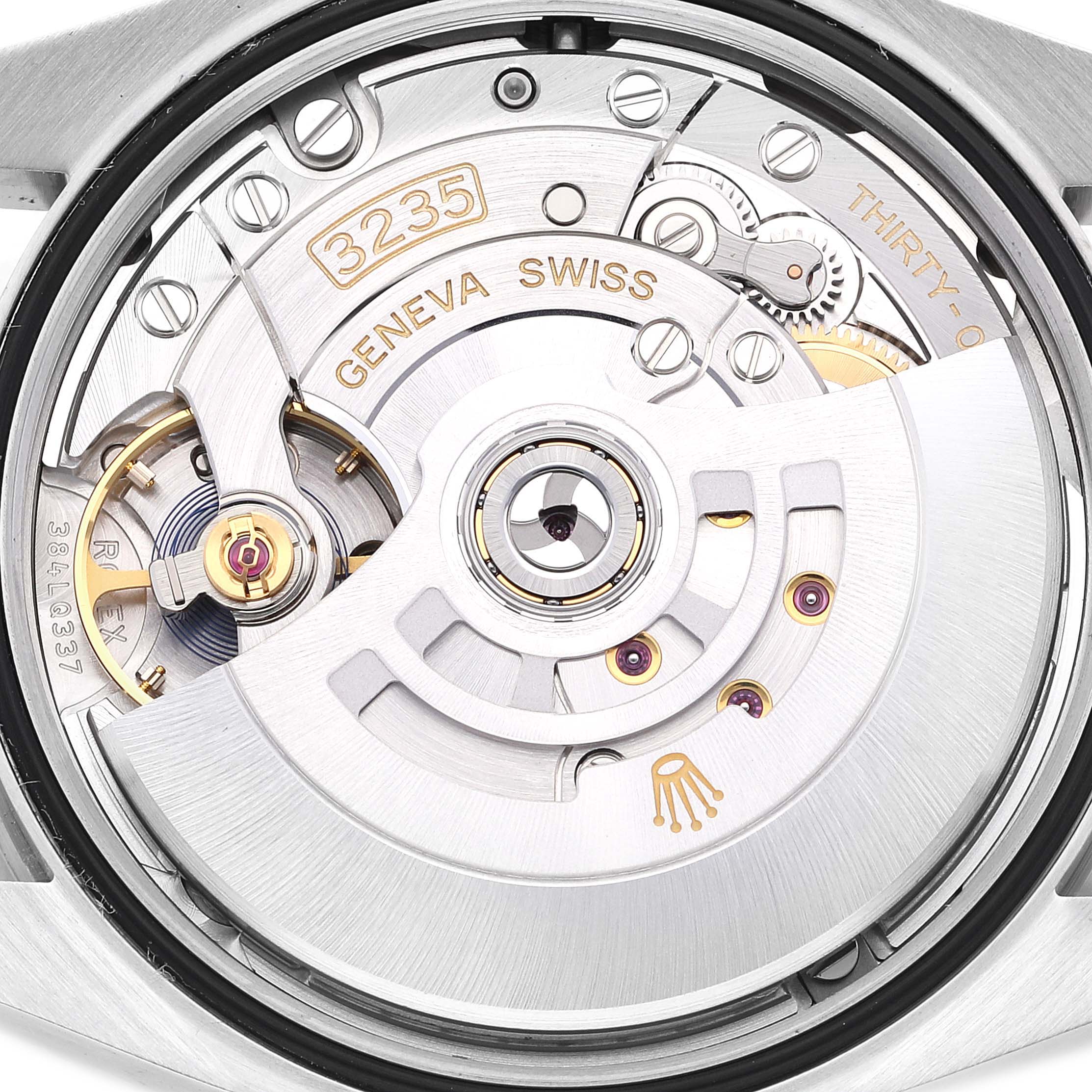 The image shows the movement mechanism of a Rolex Datejust 126234 Men's Stainless Steel Silver Dial 126234 Men's Stainless Steel Silver Dial watch, with visible gears and the "3235" and "GENEVA SWISS" markings.