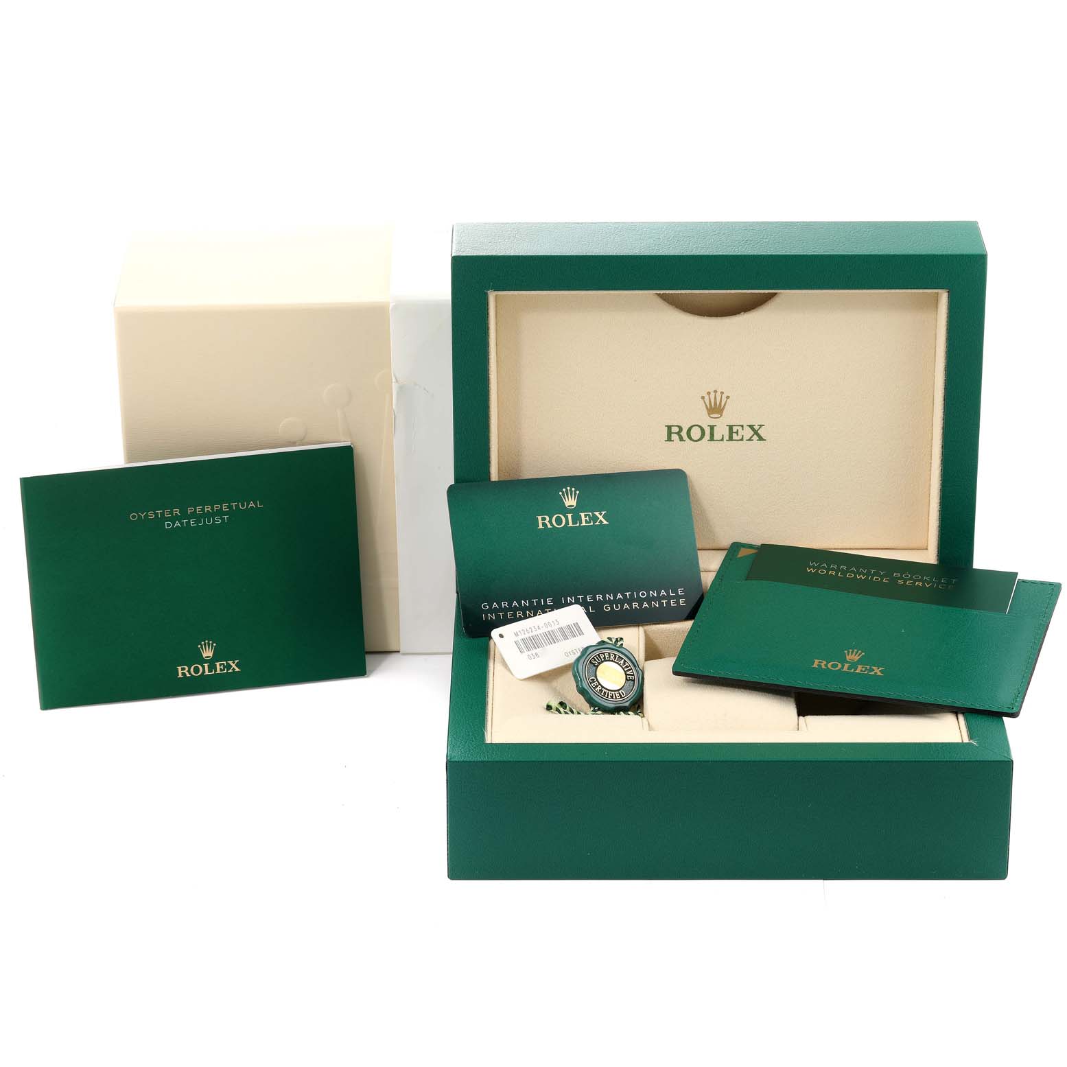 The image shows the packaging and accessories of a Rolex Datejust 126234 Men's Stainless Steel Silver Dial 126234 Men's Stainless Steel Silver Dial, including the box, manuals, tags, and warranty cards.