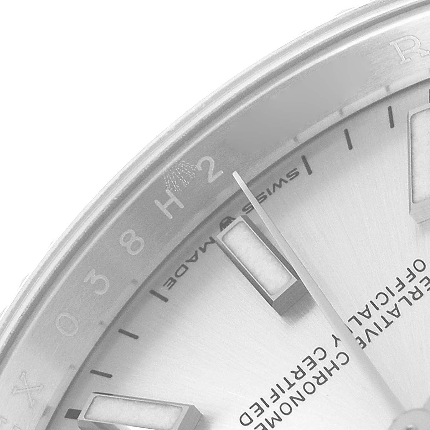 The image shows a close-up of a Rolex Datejust 126234 Men's Stainless Steel Silver Dial 126234 Men's Stainless Steel Silver Dial watch dial, focusing on the hour markers, bezel, and part of the minute hand.