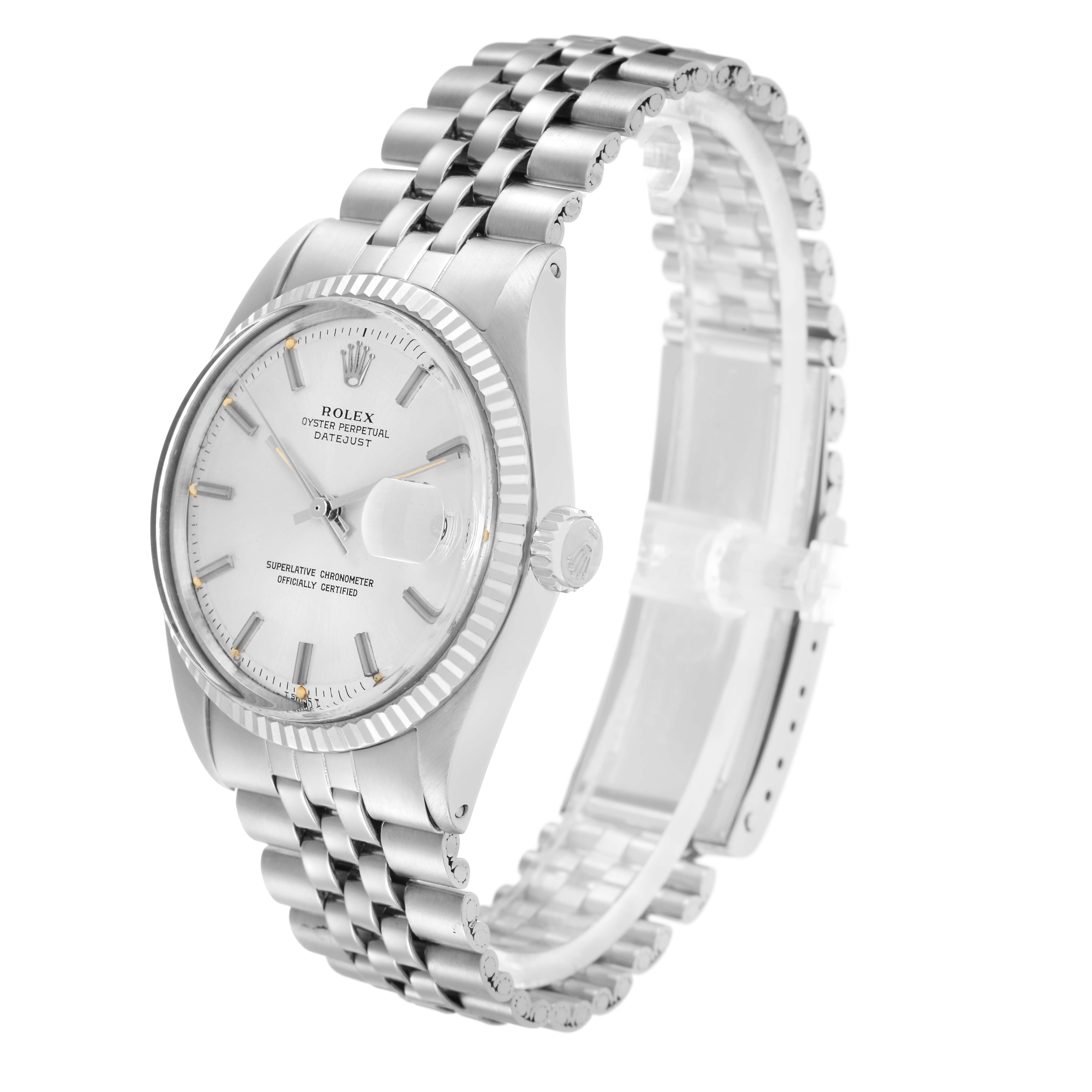 The Rolex Vintage Collection model 1601 is shown at a three-quarter angle, displaying its face, fluted bezel, crown, and Jubilee bracelet.